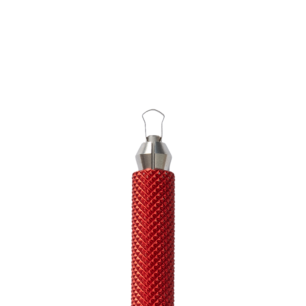 The BuschKraft Dragonfly precision carving tool, a knurled metal handle holding a blade tip in the collet.