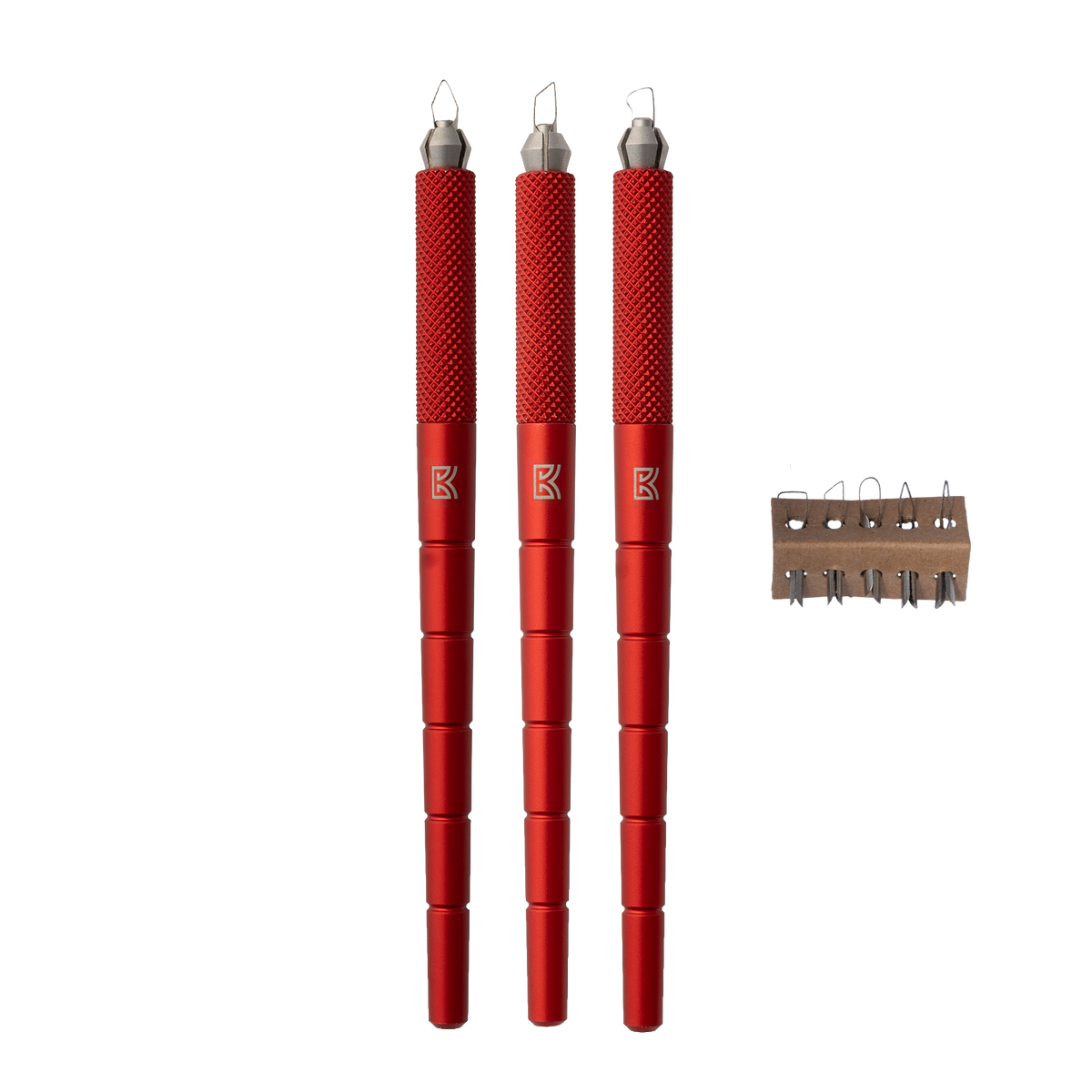 The BuschKraft Dragonfly carving tool starter kit: the knurled metal handle with its collet and a set of interchangeable blade tips.
