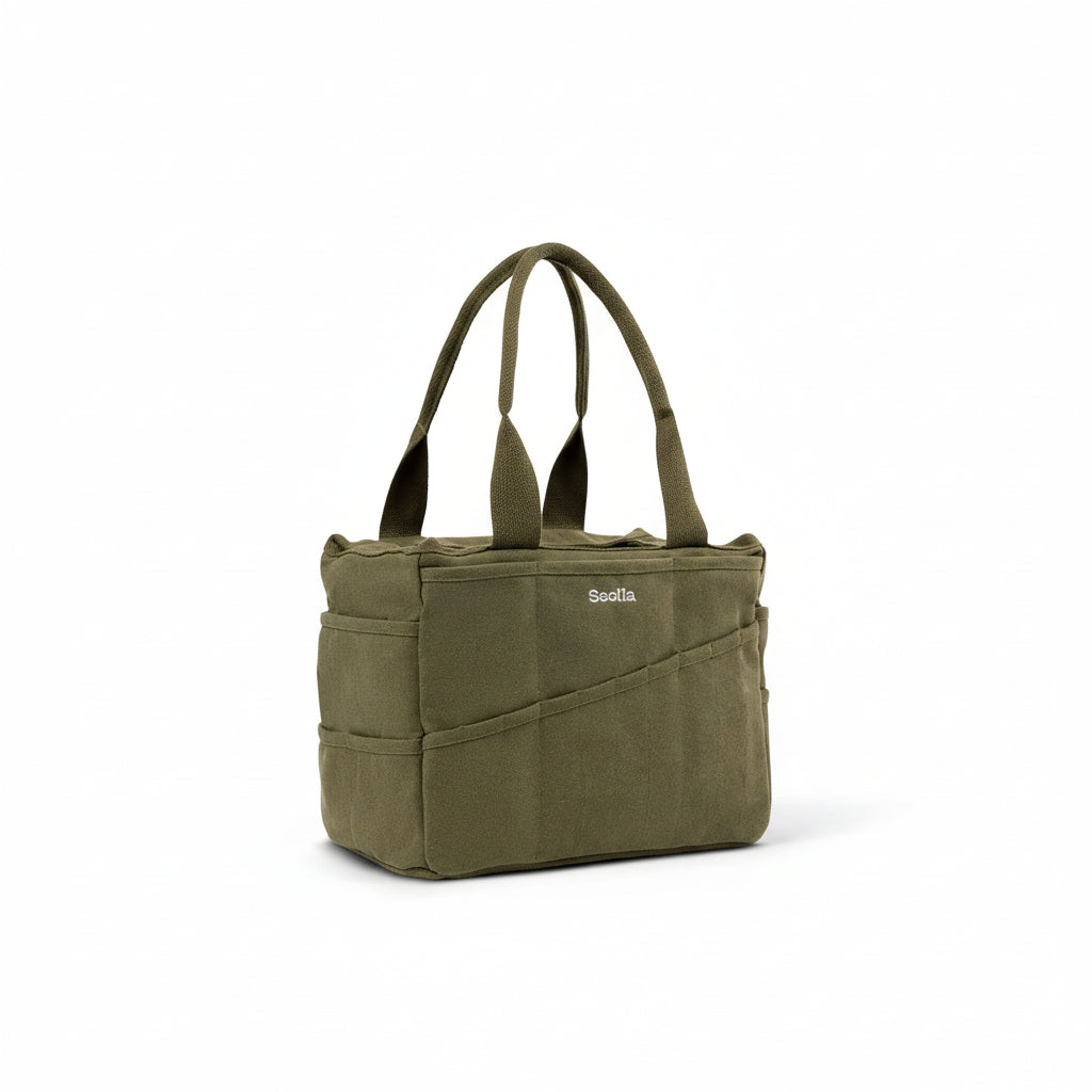 Green tool pottery bag with 'Soolla' branding on a white background