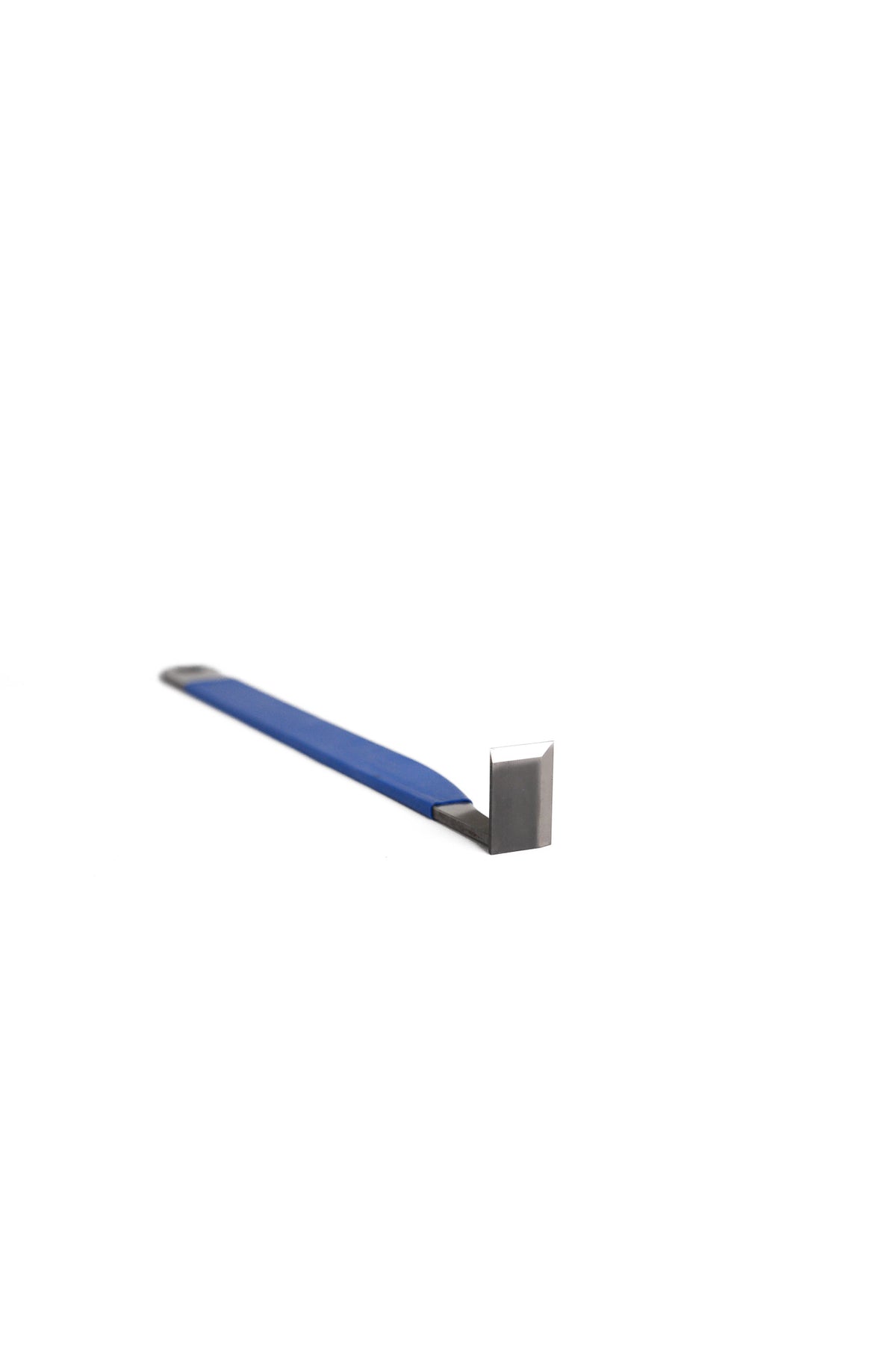 Close-up of tungsten steel edge showing sharp, durable cutting profile