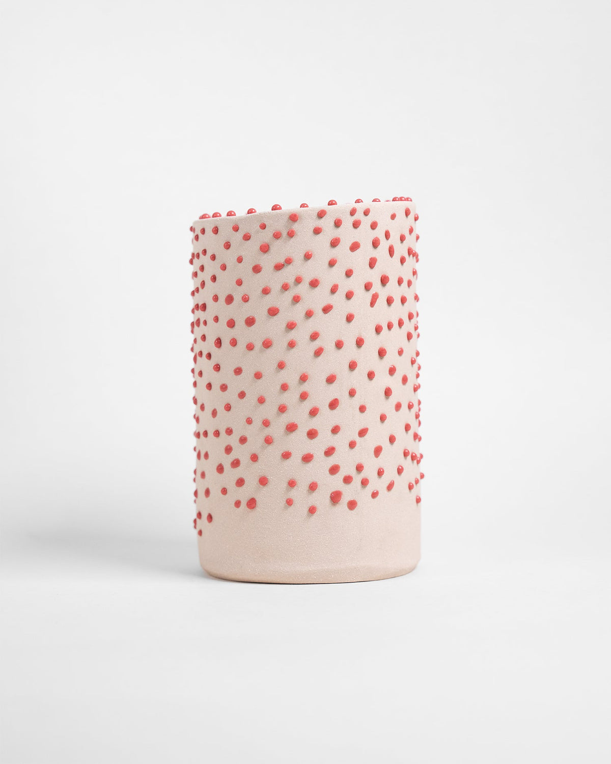 Bright pink Liquid Gloop glaze, perfect for adding vibrant finishes and textured effects to ceramic pieces.