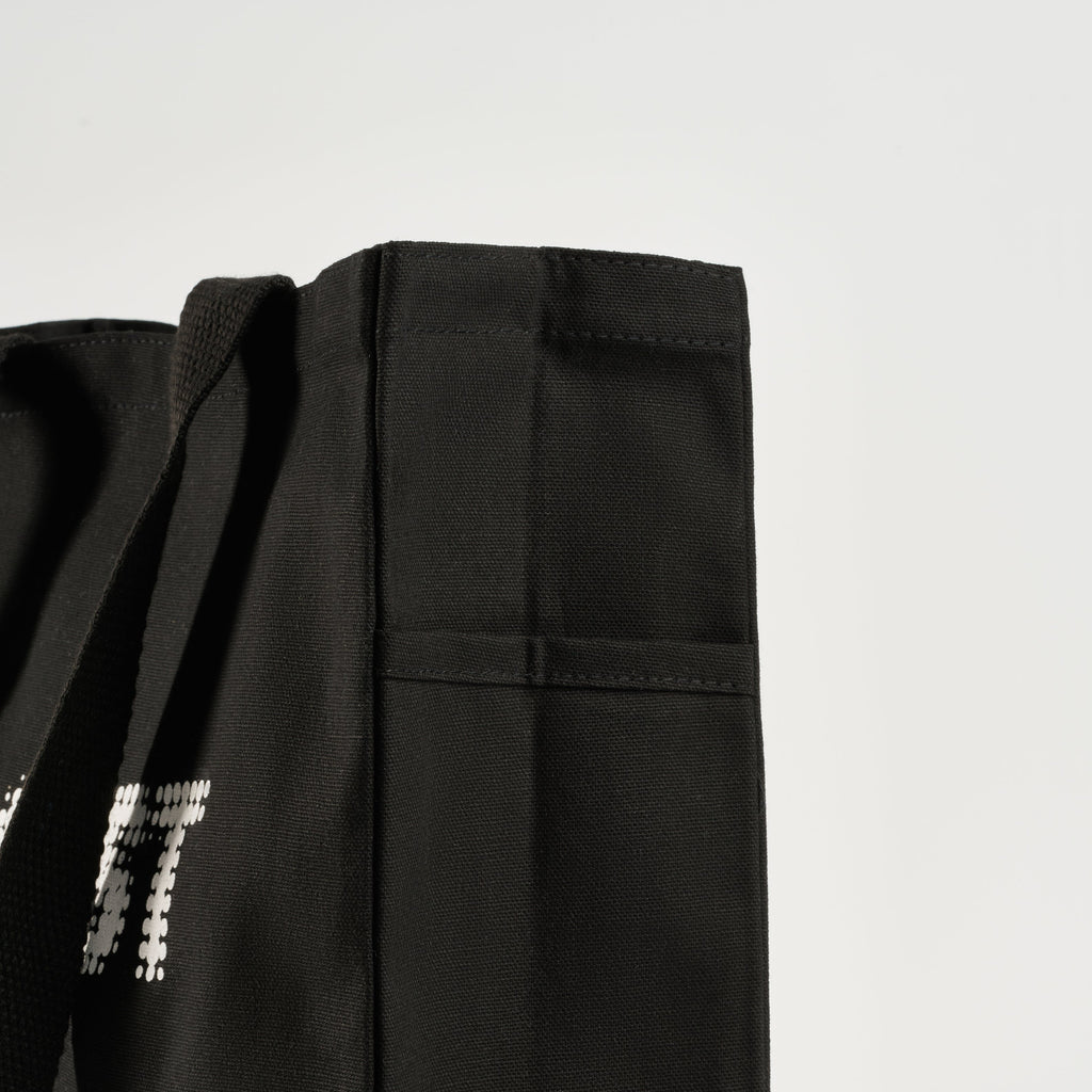 GLOST black cotton tote bags, folded