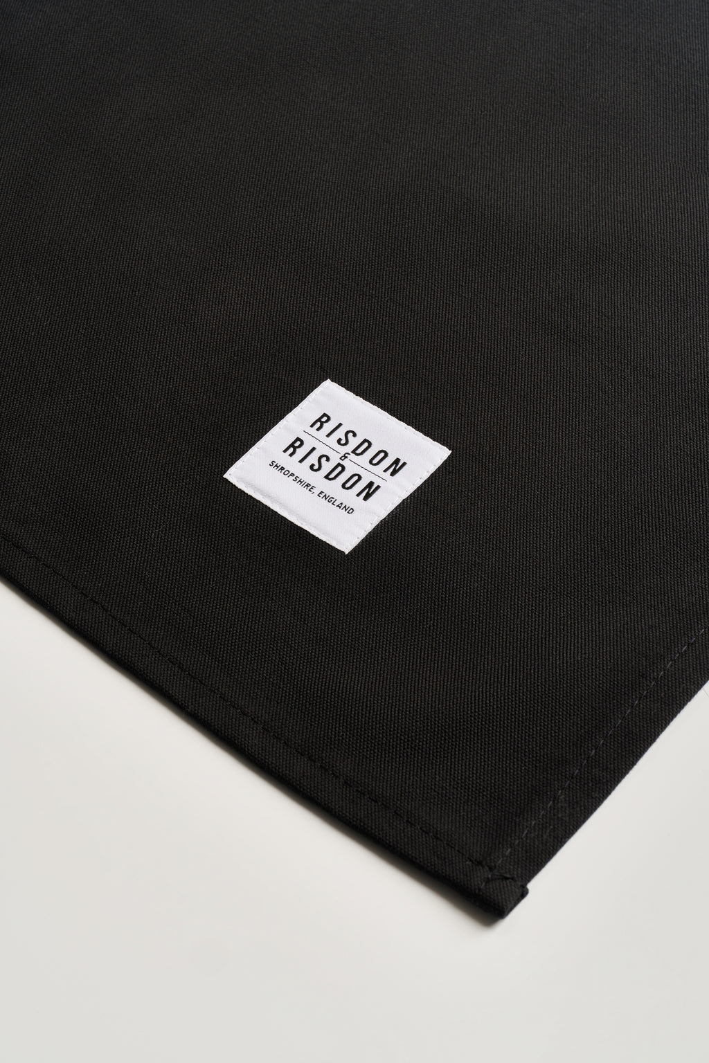 Detail of a hand made potters apron by Risdon and Risdon. Made in the UK by hand