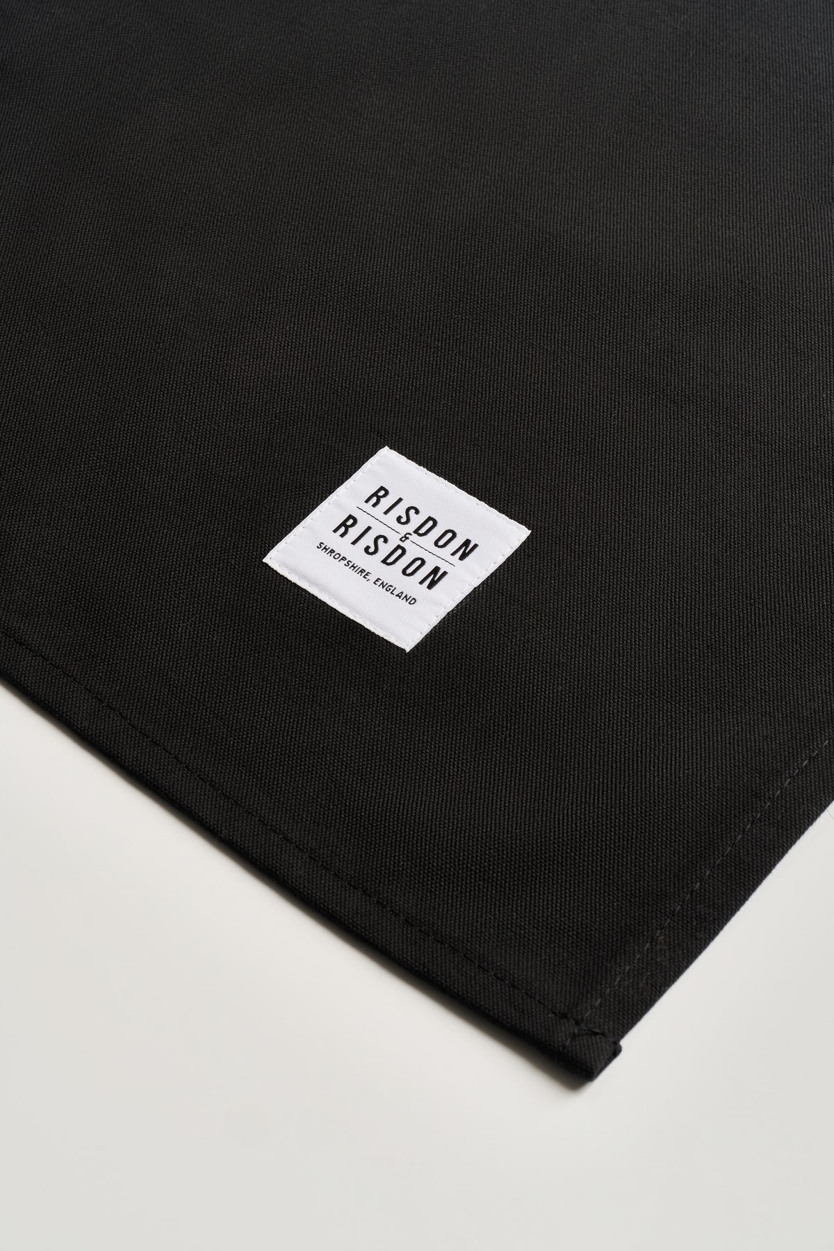 Detail of a hand made potters apron by Risdon and Risdon. Made in the UK by hand