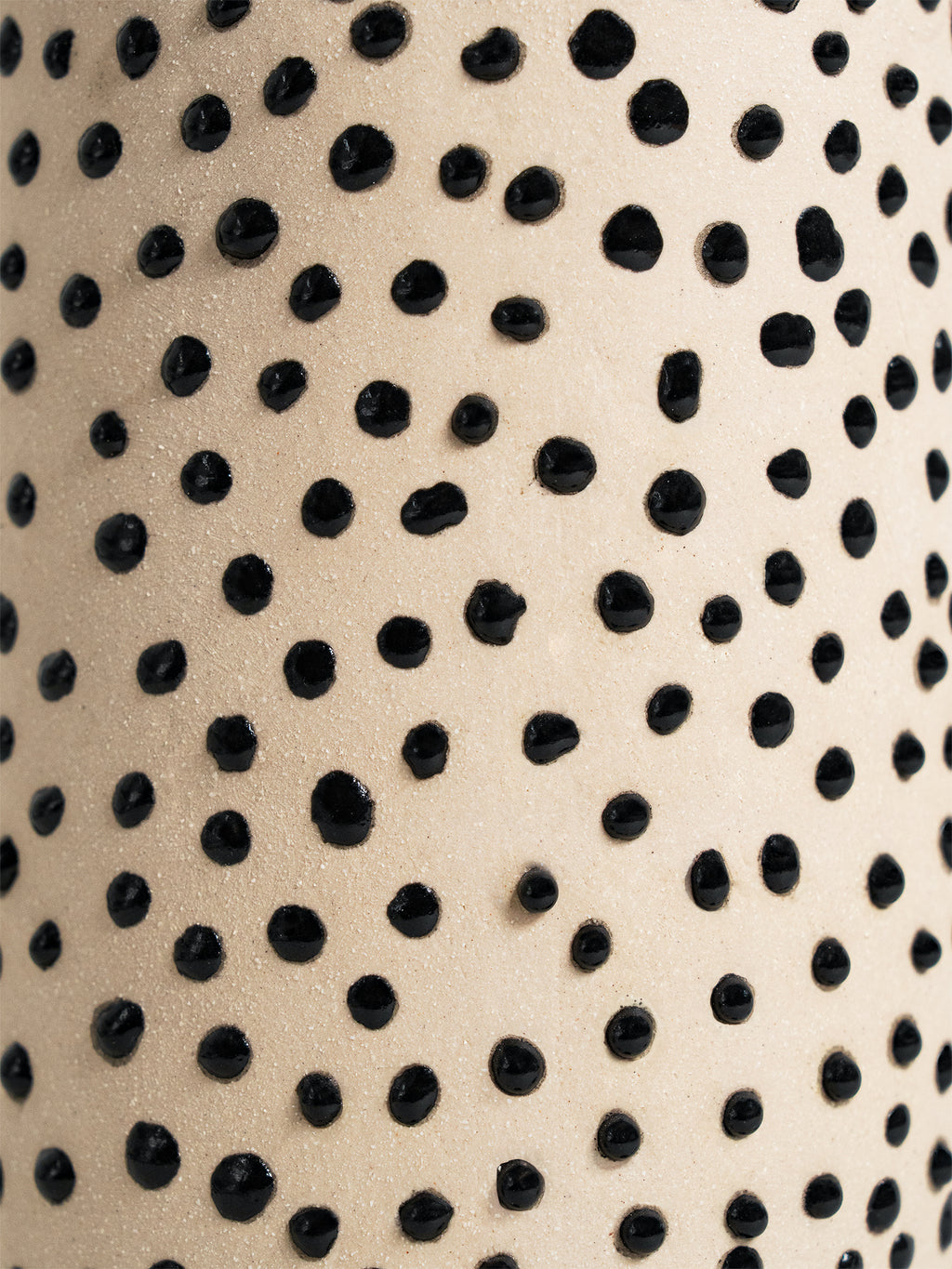 Versatile Liquid Gloop ceramic glaze in black, designed for achieving intricate textures and raised patterns on pottery.