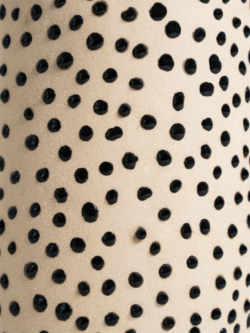 Versatile Liquid Gloop ceramic glaze in black, designed for achieving intricate textures and raised patterns on pottery.