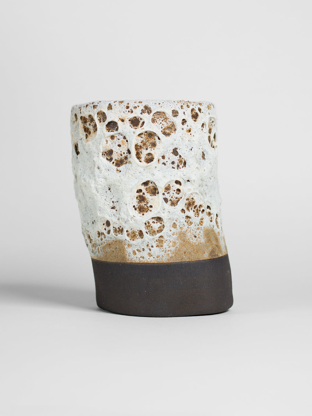 White Lava brush-on glaze creating dimensional volcanic textures, perfect for sculptural ceramics and relief surface effects.