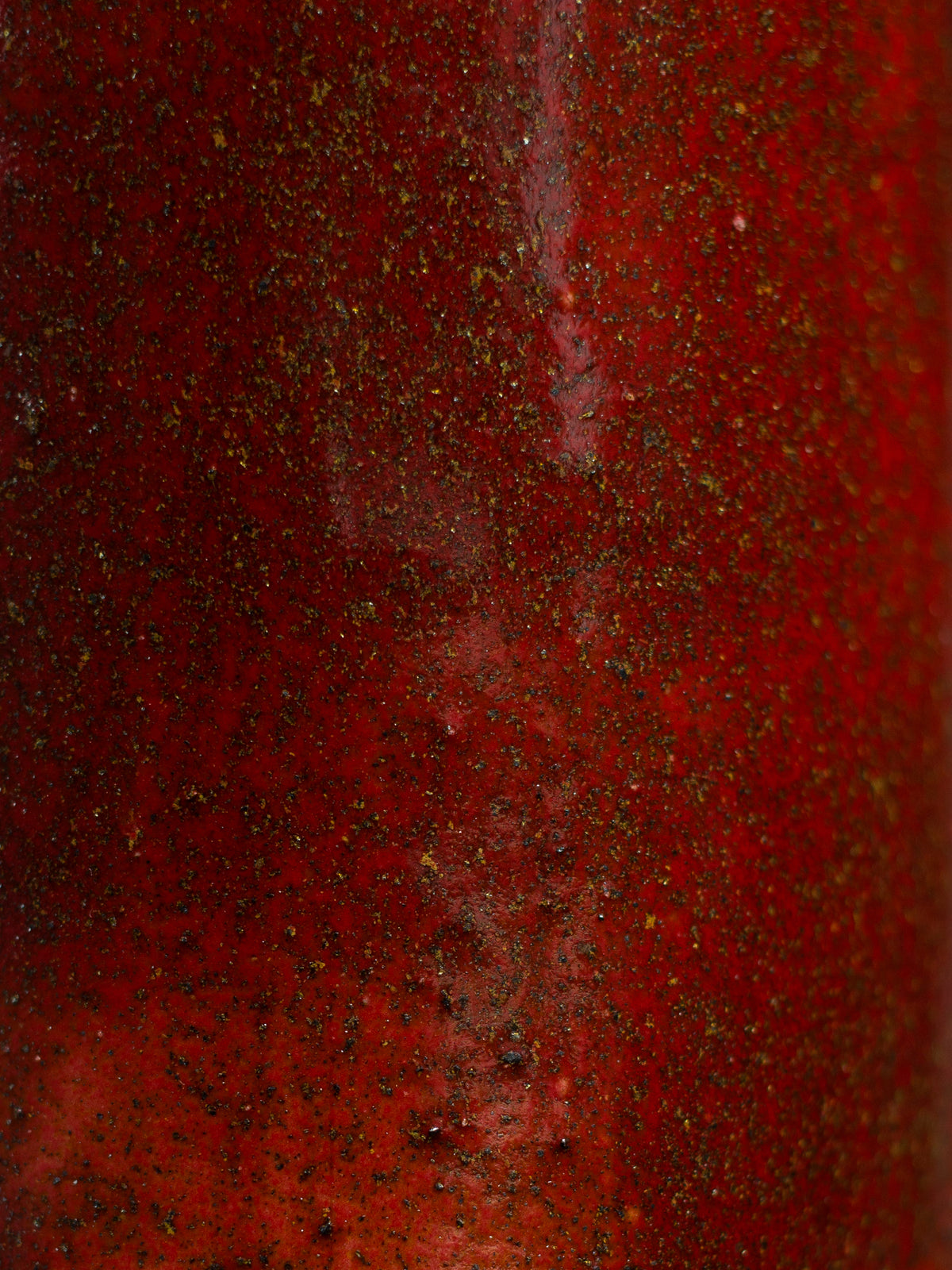 A ceramic piece finished in Cranberry Red glaze from the Festive Glaze Set.