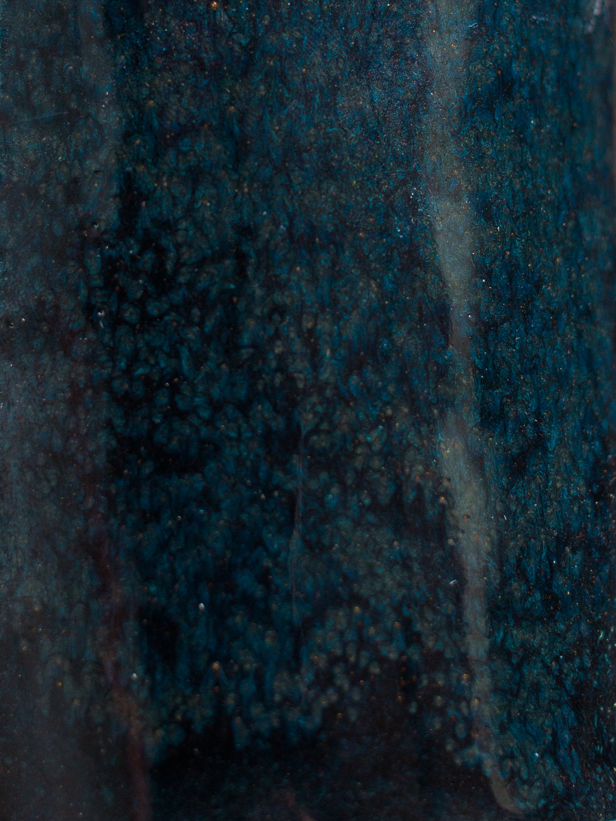 A thrown ceramic form finished in a glaze from the GLOST Glaze Taster Set.