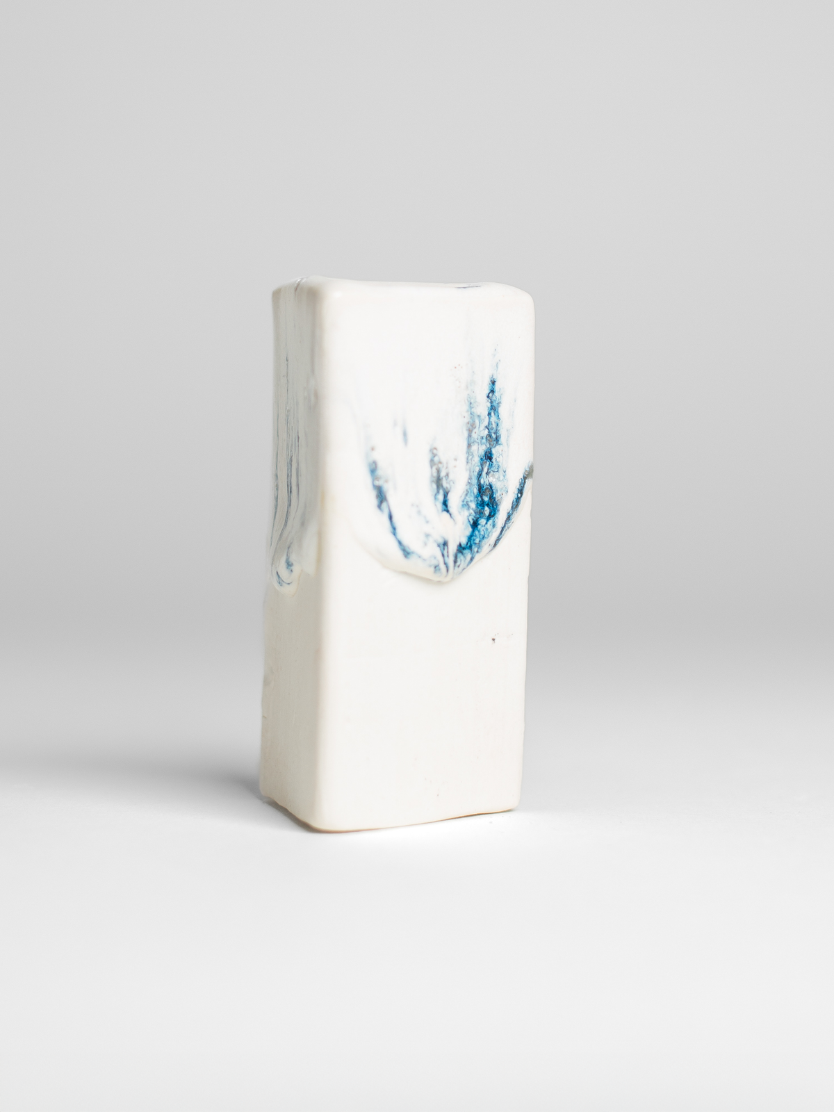 Recycled Glaze Sprinkle on a white clay test tile