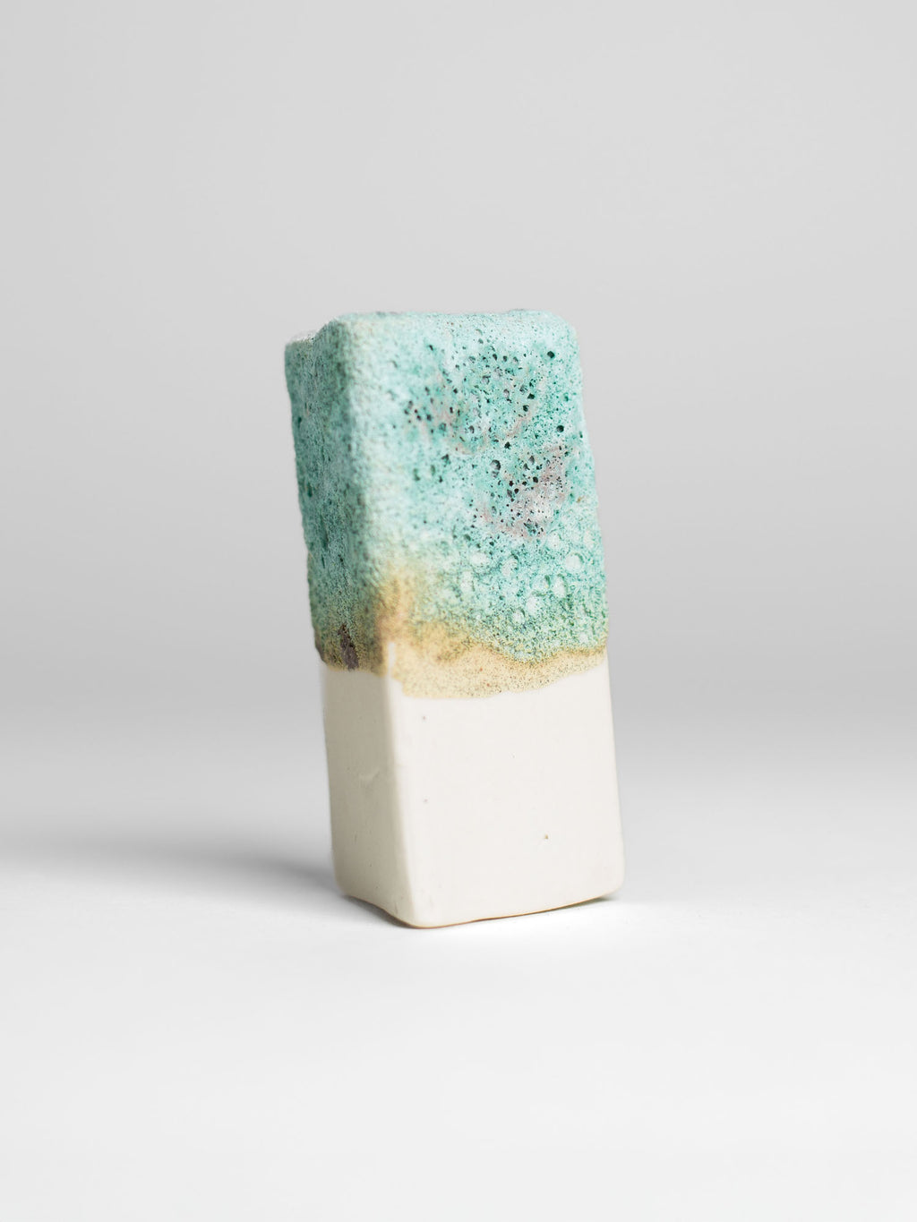 Ceramic piece featuring Sea Foam glaze with pronounced textures and tonal shifts from turquoise to light green.
