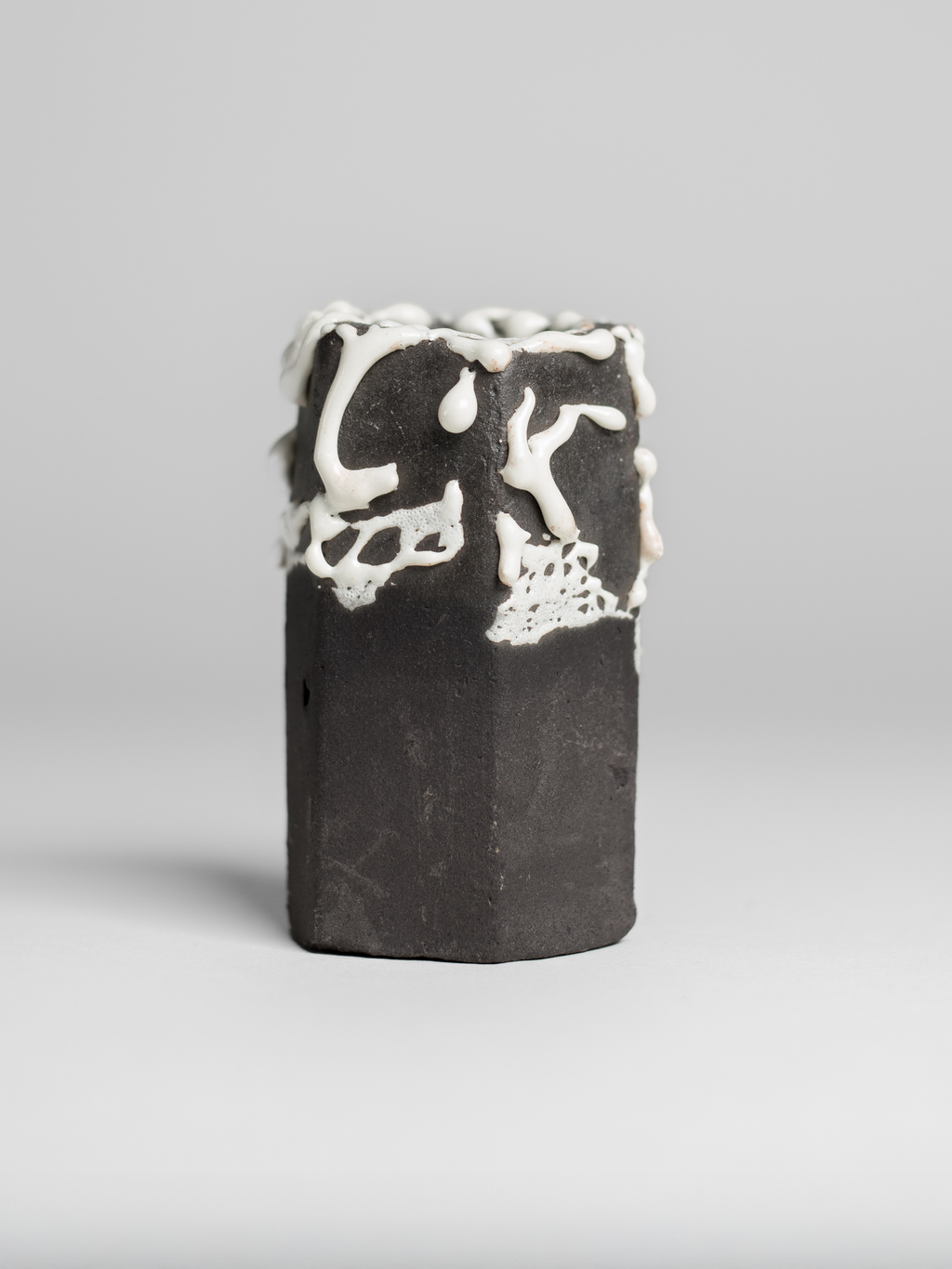 Crawl Textured White glaze on a black clay test tile