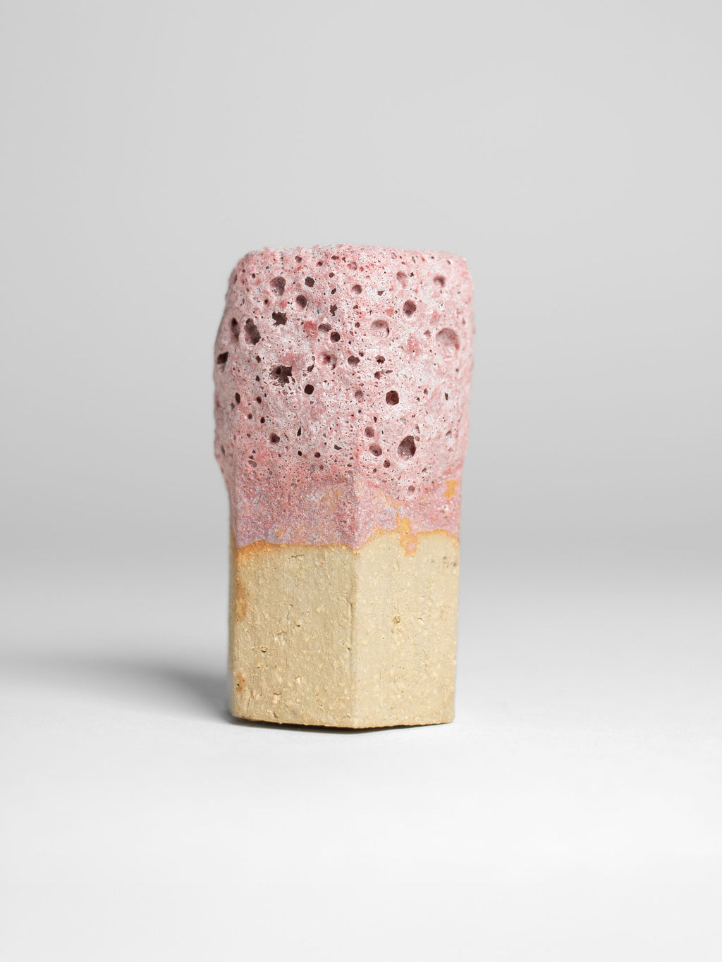Pink Lava ceramic glaze creating textured surfaces with baby pink to deep pink tones, replicating volcanic formations.