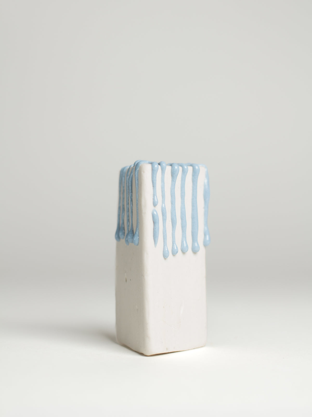 Light Blue Liquid Gloop on a white clay test tile