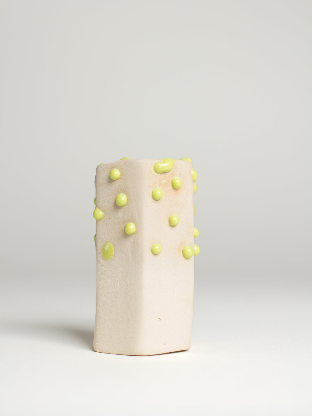 Green Liquid Gloop on a pale fired test cylinder