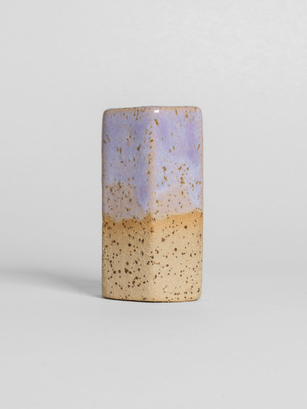 Lavender Gloss on a test cylinder over a tan clay body