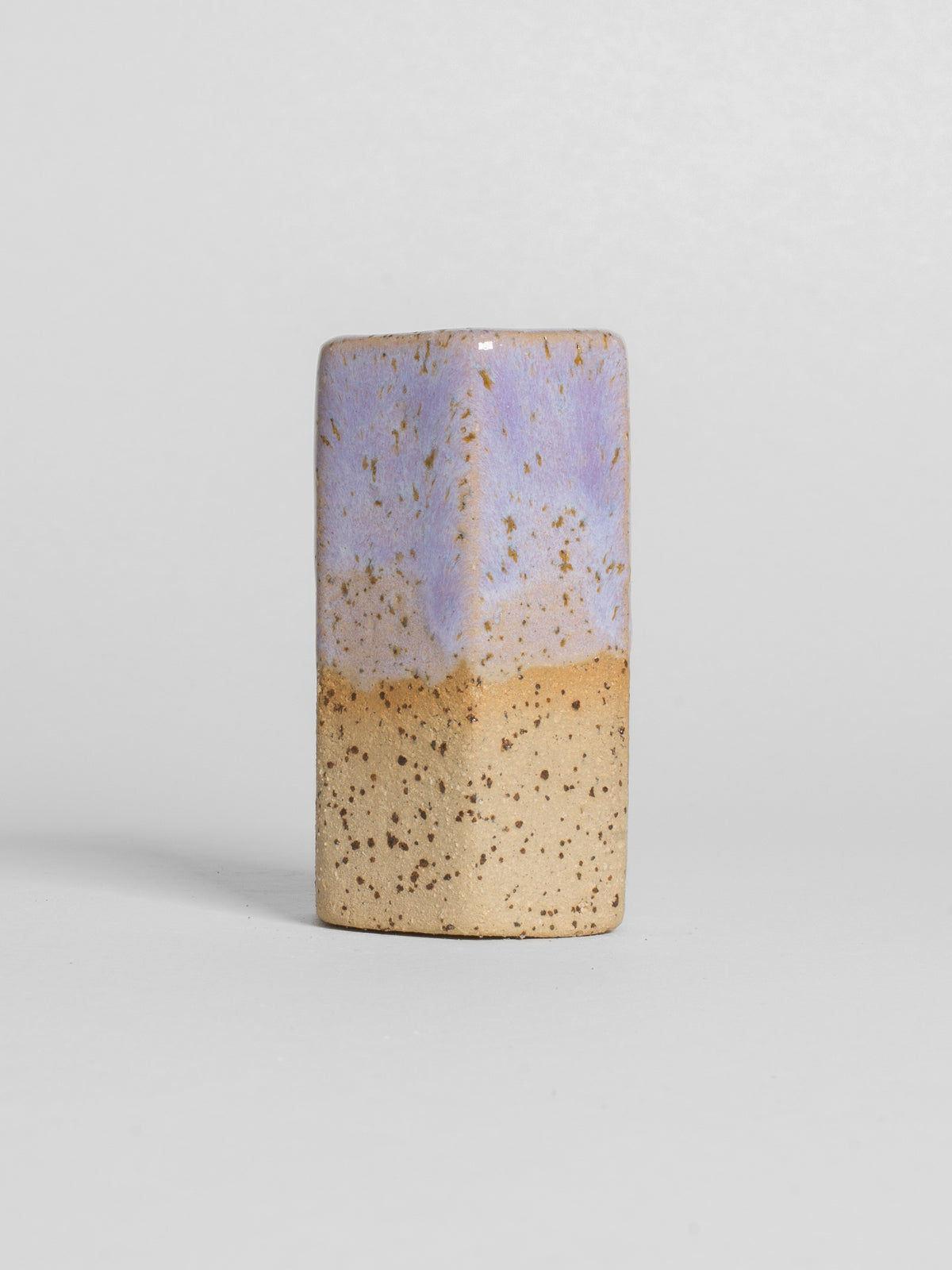 Lavender Gloss on a test cylinder over a tan clay body