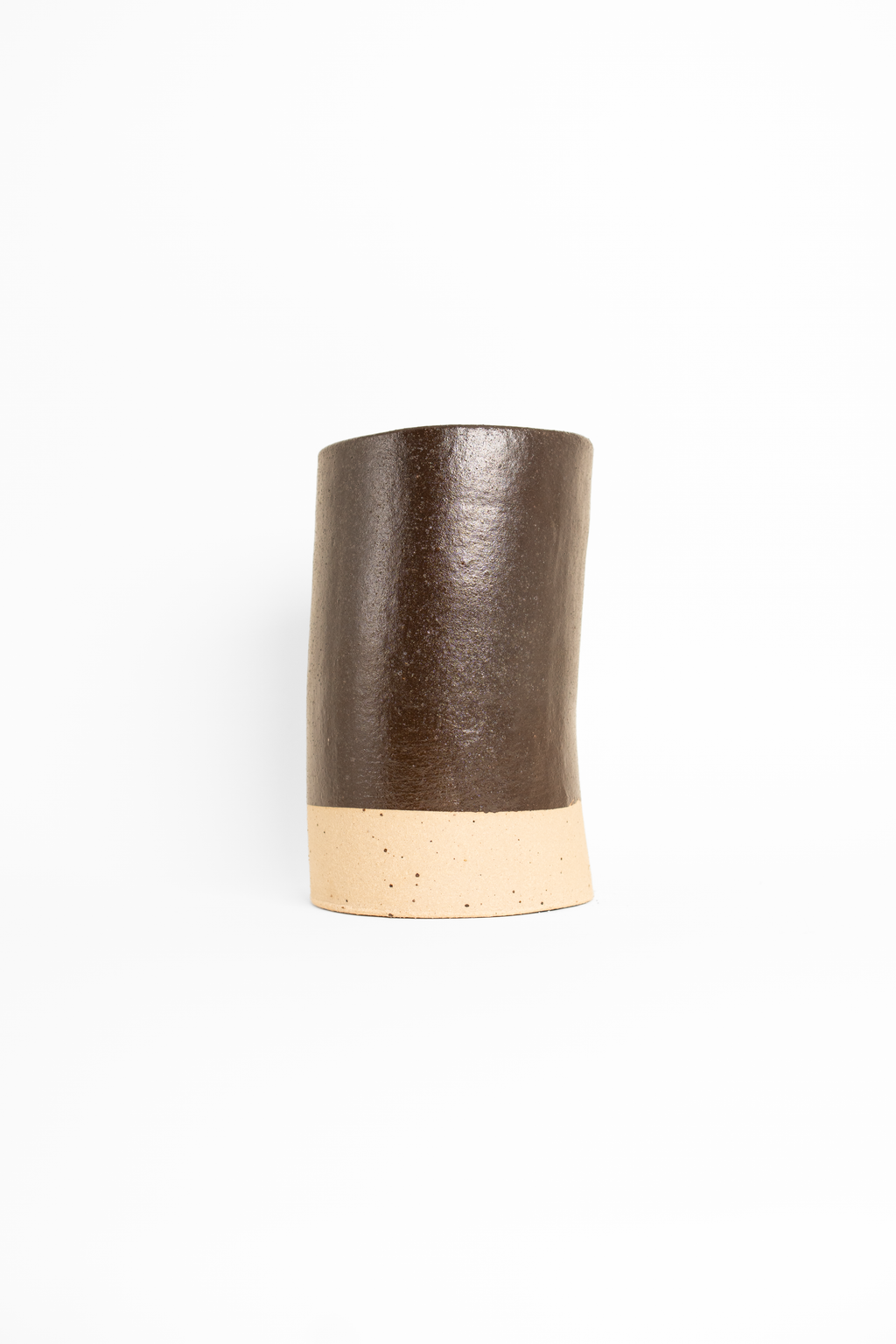 Silt Reclaimed Dark Brown glaze on a small test cylinder