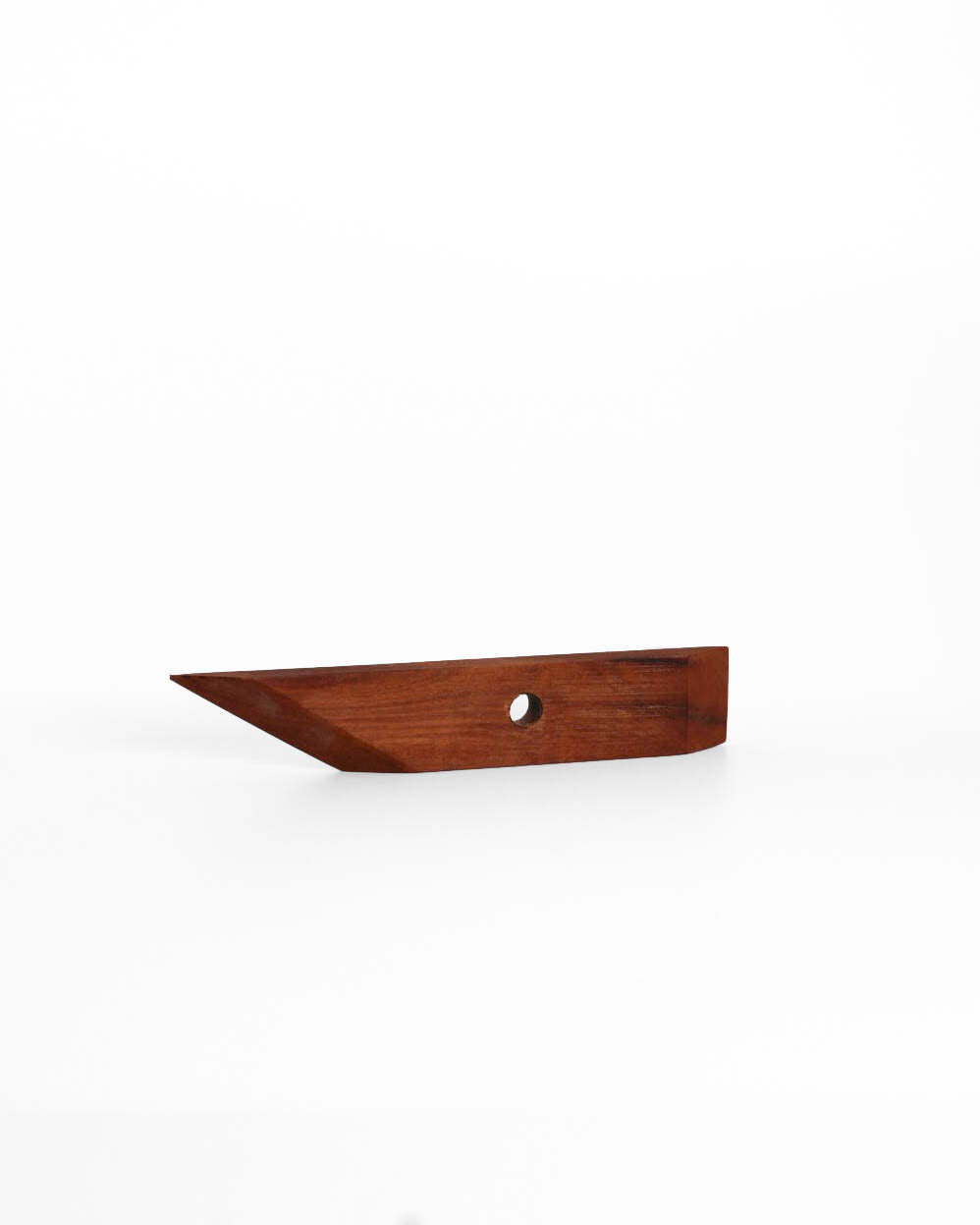 Large wooden kidney seen edge on