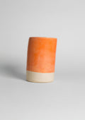 Peach shiny glaze on stoneware clay 
