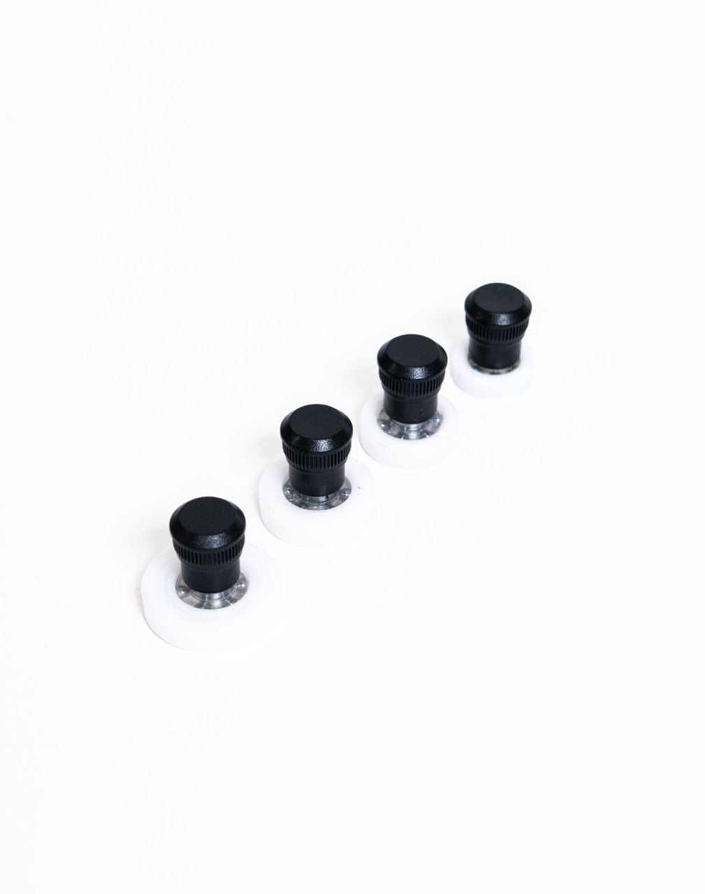 Trimming spinners for steadying a pot on the wheel head while turning, from GLOST