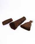 Three palm fibre brushes together, a small block, a long conical brush and a flat fan