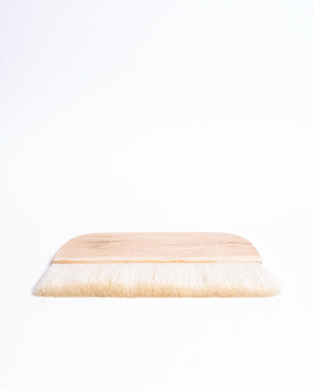 Wide flat brushes for applying slip and glaze to large surfaces, from GLOST