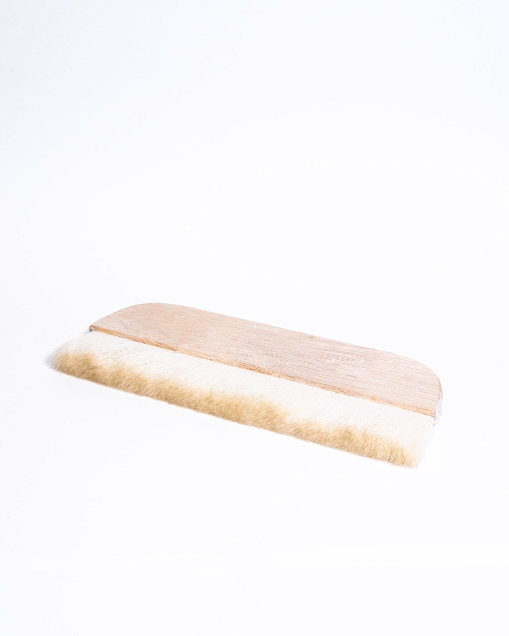 Wide flat brushes for applying slip and glaze to large surfaces, from GLOST