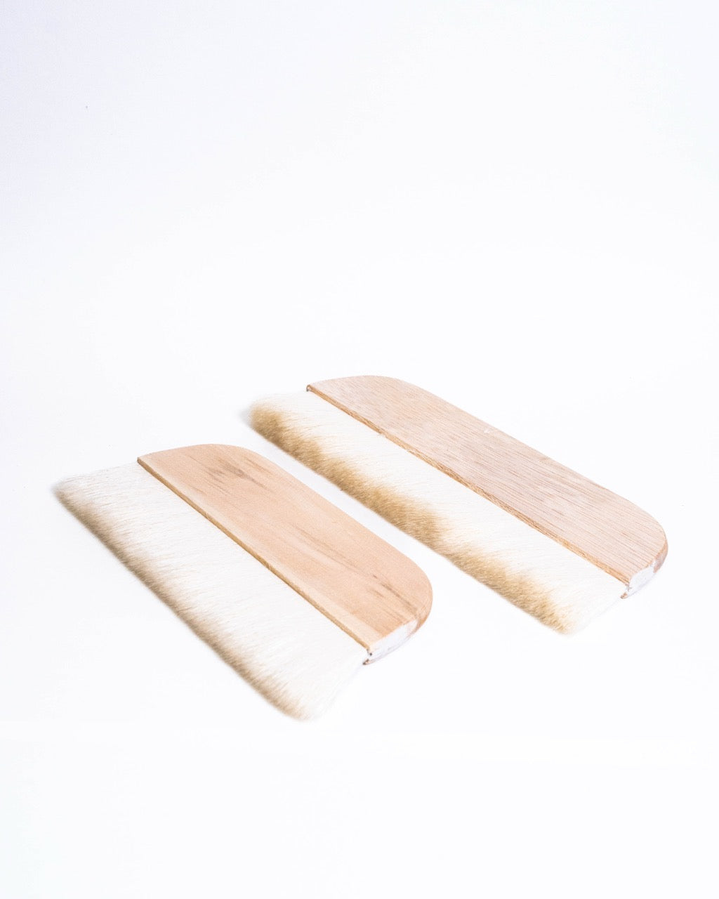 Wide flat brushes for applying slip and glaze to large surfaces, from GLOST