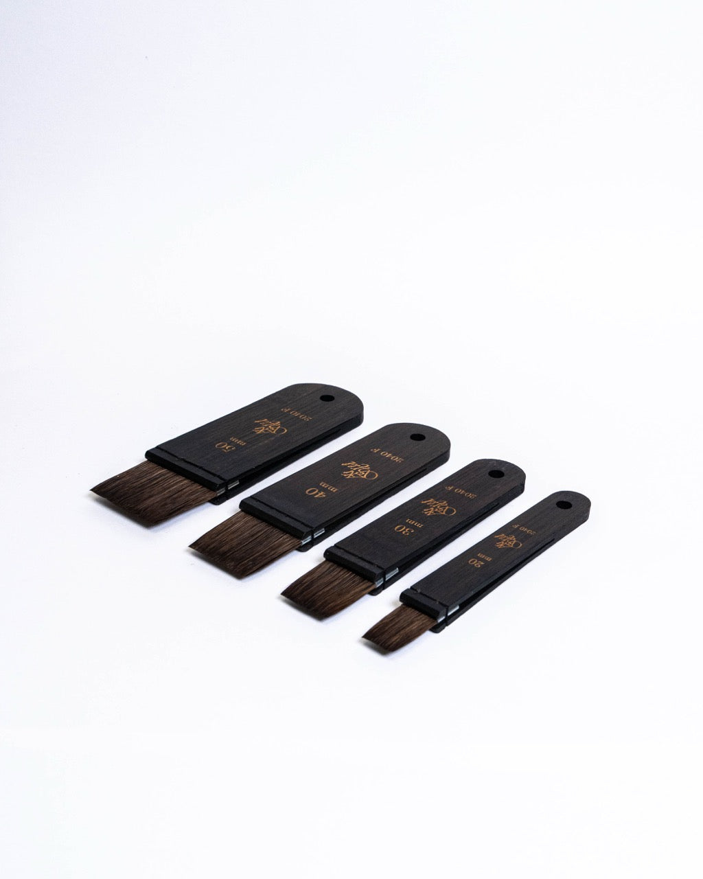 Dark wood flat brushes laid together