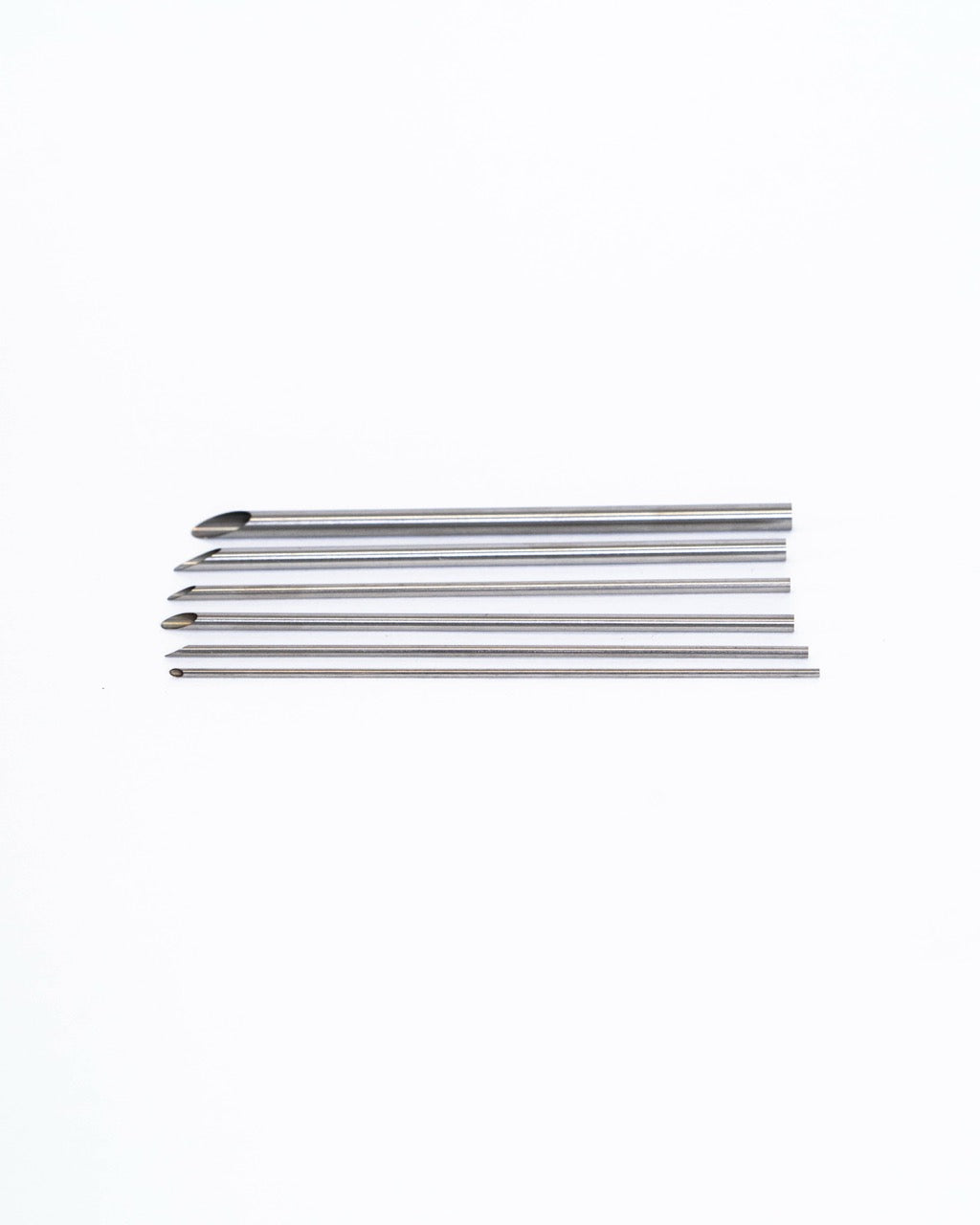 Steel and brass hole punching tools for clay from GLOST