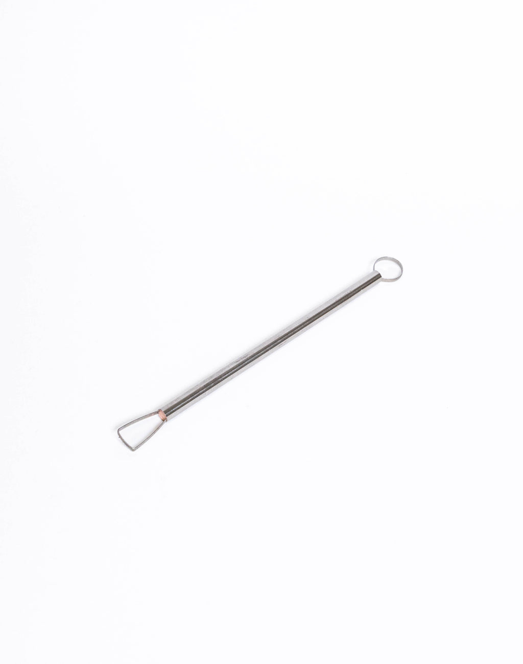 Metal loop trimming tool laid flat, trapezoid loop in a copper collar at one end and a round ring at the other