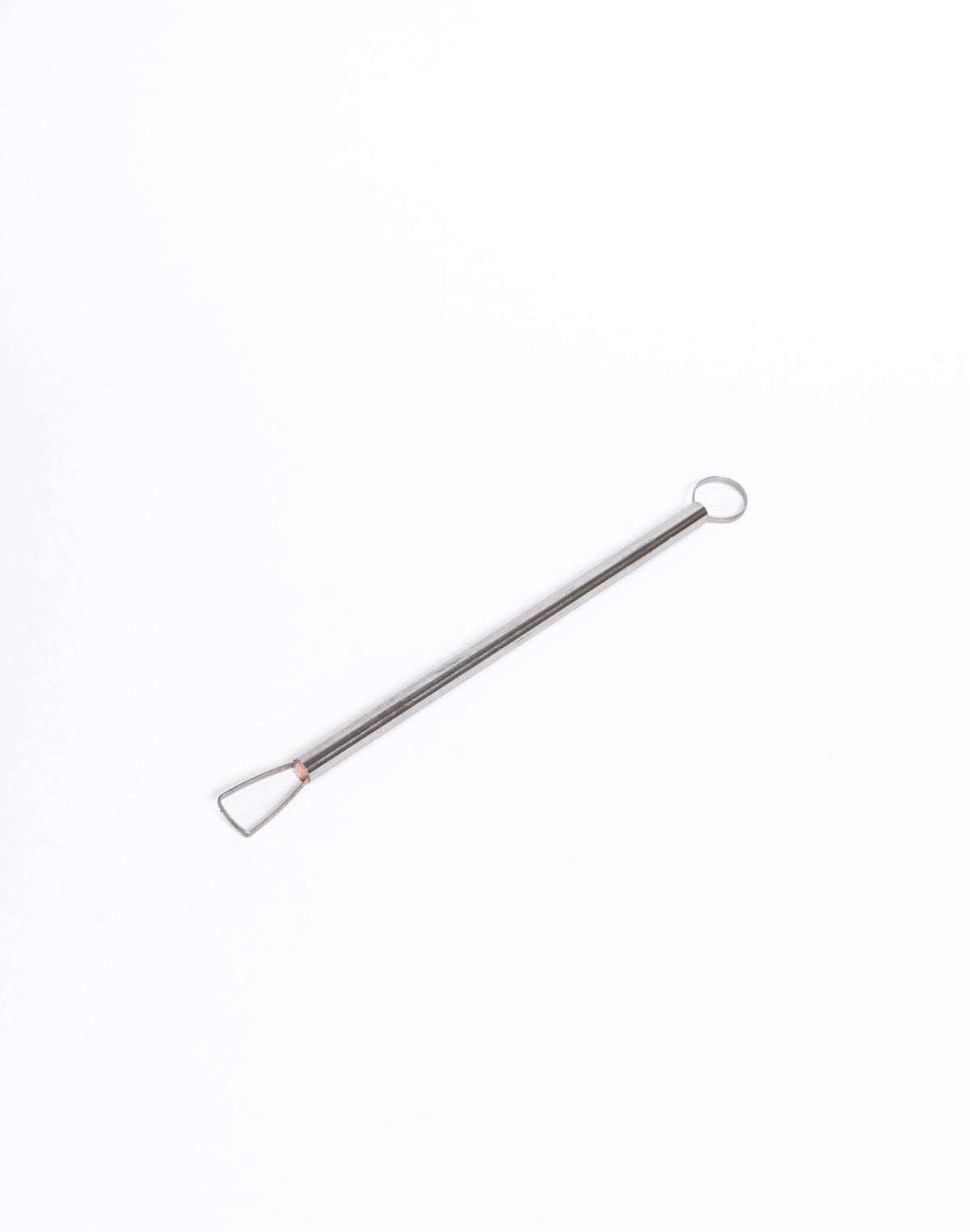 Metal loop trimming tool laid flat, trapezoid loop in a copper collar at one end and a round ring at the other
