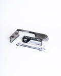 Flat steel knife with its blade box and spanner, knife standing on its cutting edge