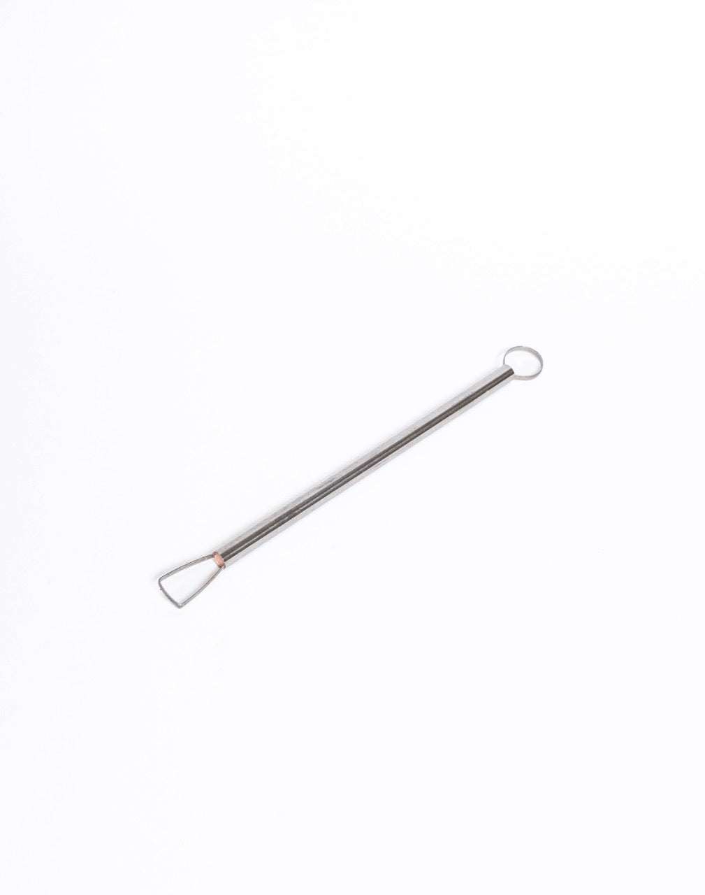 Metal loop trimming tool laid flat, trapezoid loop in a copper collar at one end and a round ring at the other