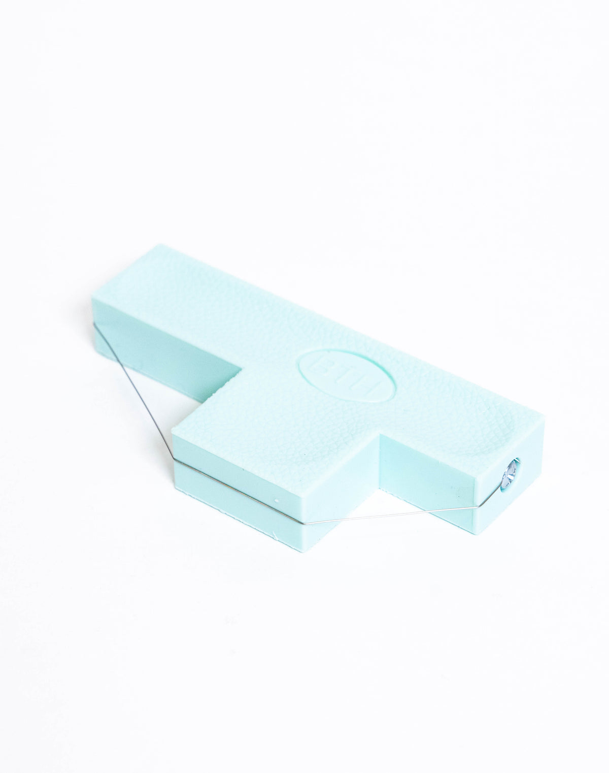 Bevel wire tools for cutting clean angled edges on clay slabs, from GLOST