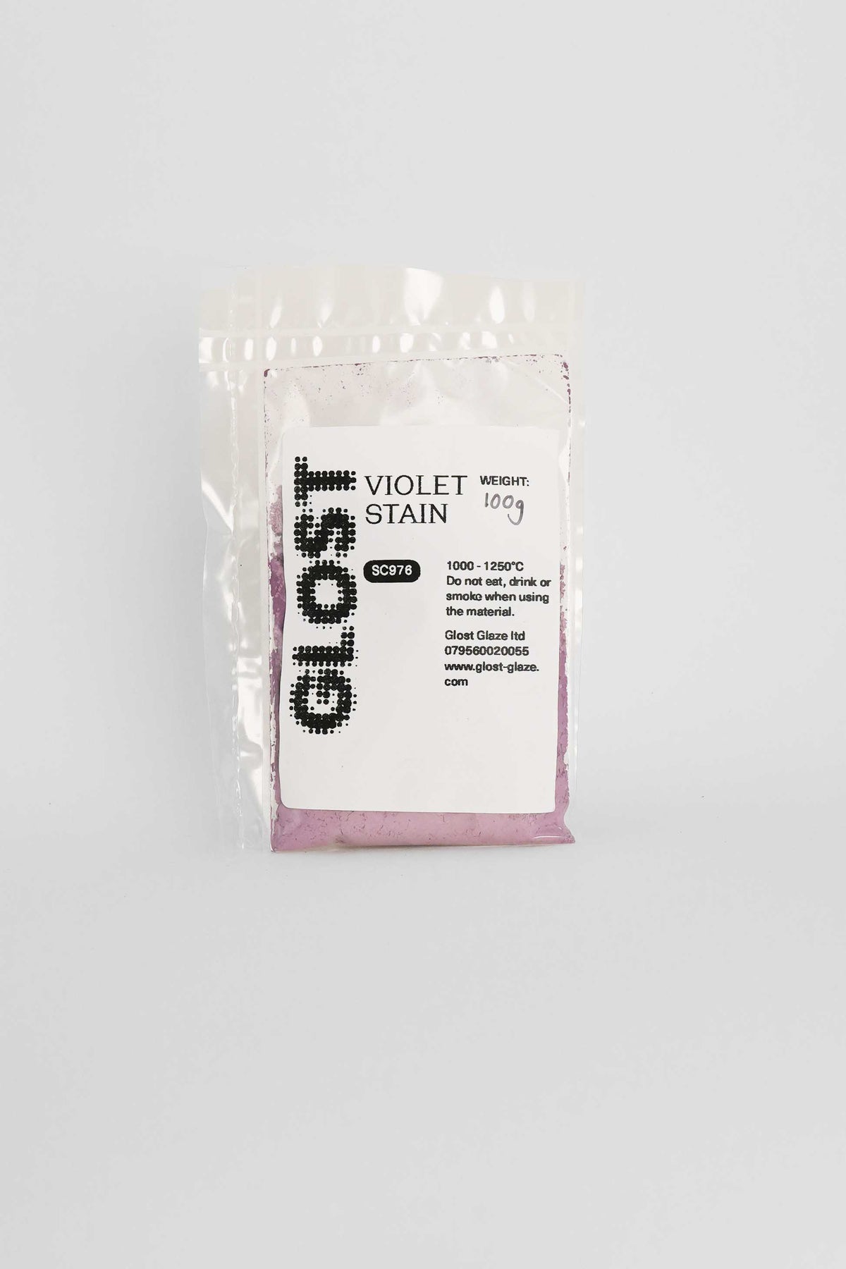 Violet ceramic stain by GLOST Glaze, 100g sachet, for colouring glazes, slips, and clay bodies. Made in Britain.