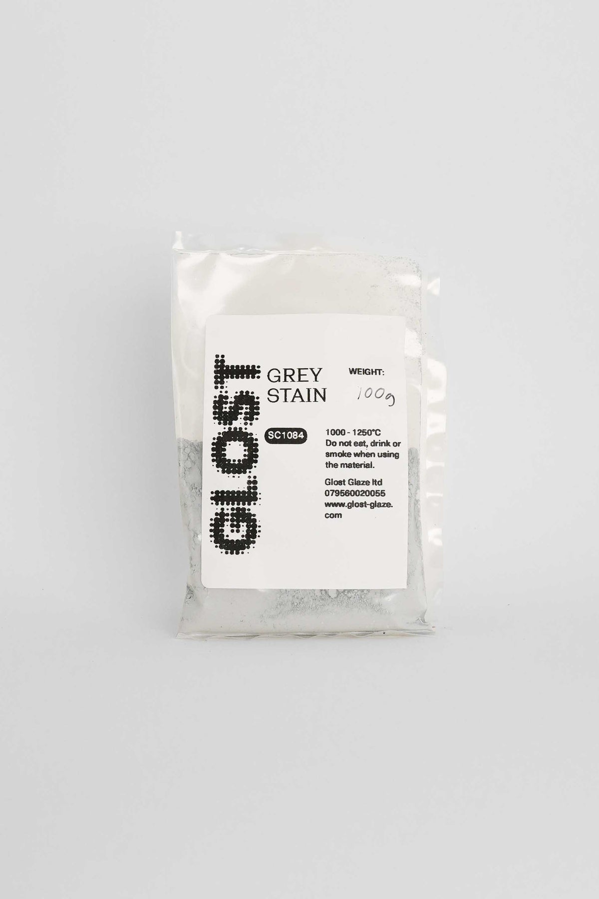 Grey ceramic stain by GLOST Glaze, 100g sachet, for colouring glazes, slips, and clay bodies. Made in Britain.