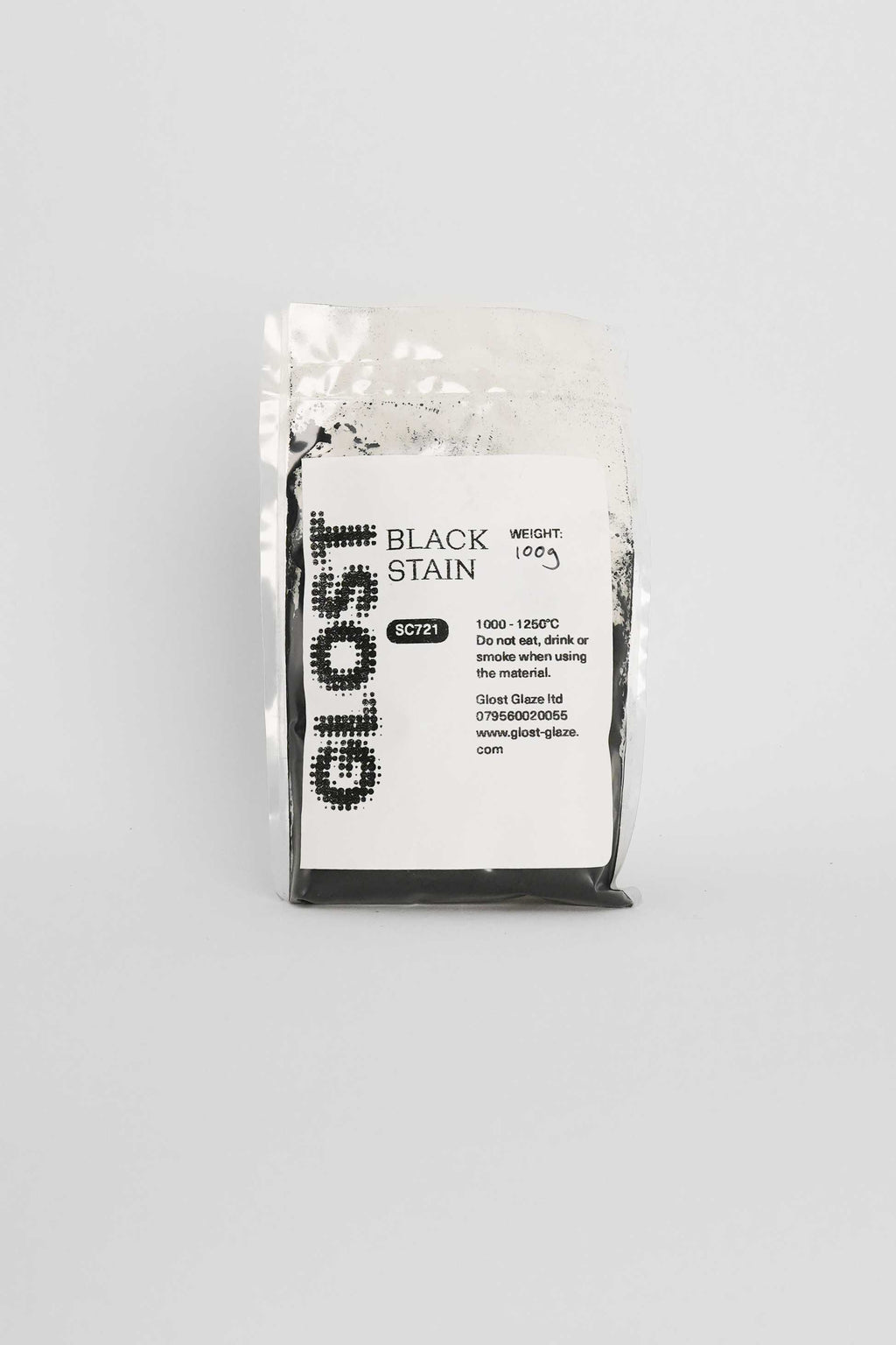 Black ceramic stain by GLOST Glaze, 100g sachet, for colouring glazes, slips, and clay bodies. Made in Britain.