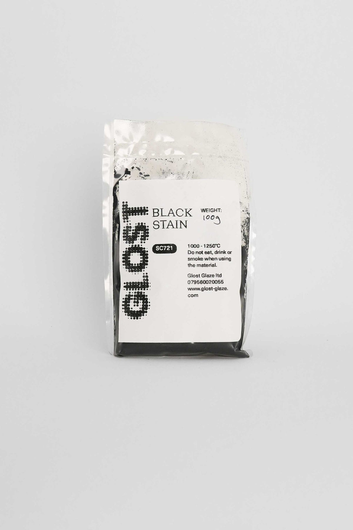 Black ceramic stain by GLOST Glaze, 100g sachet, for colouring glazes, slips, and clay bodies. Made in Britain.