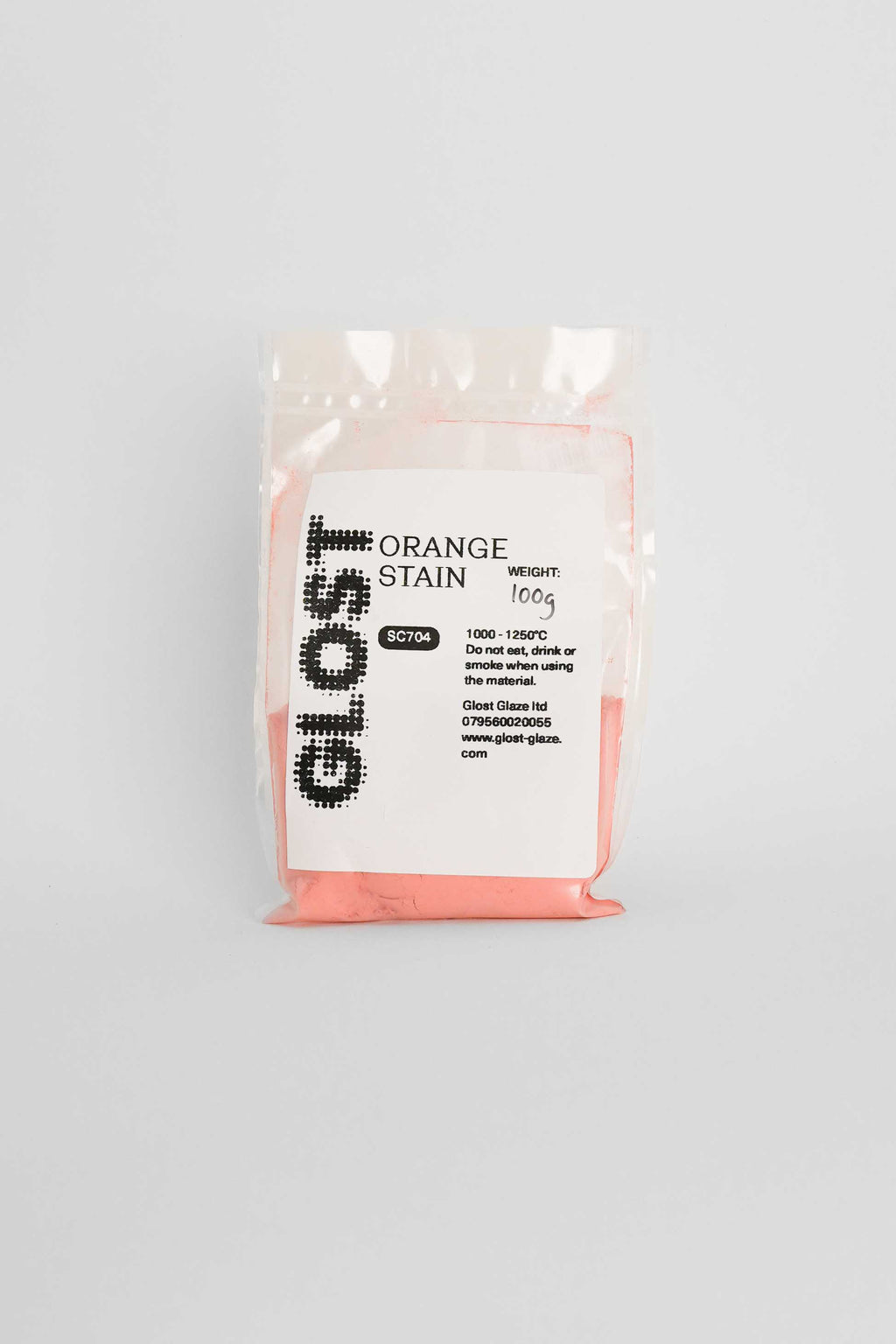 Orange ceramic stain by GLOST Glaze, 100g sachet, for colouring glazes, slips, and clay bodies. Made in Britain.