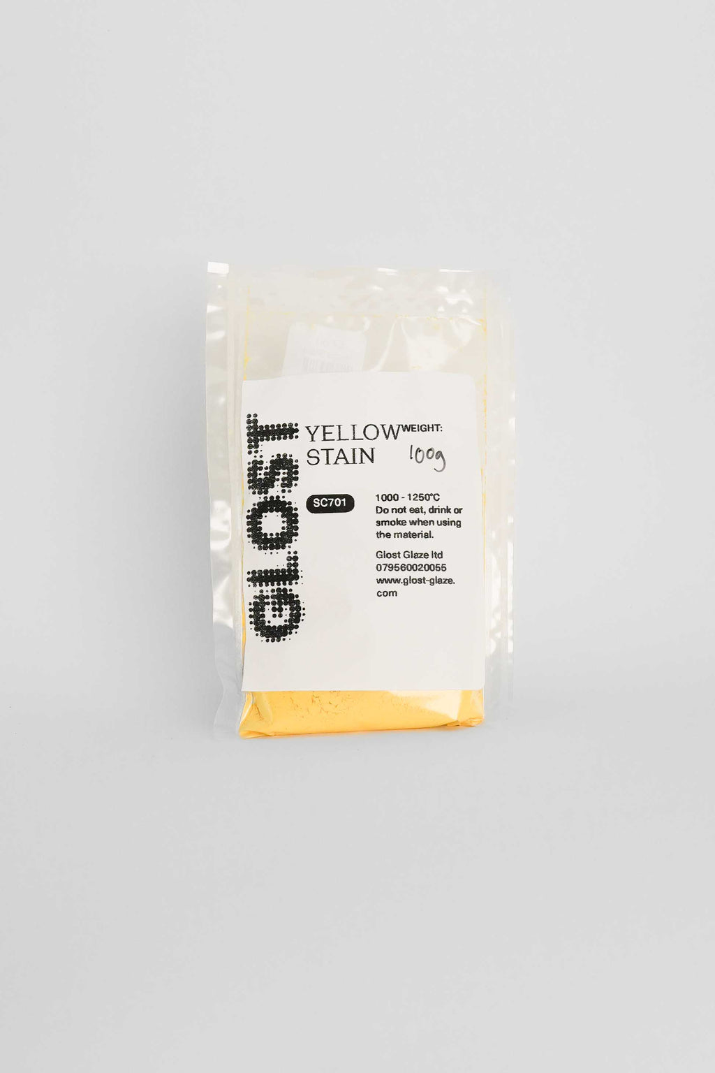 Yellow ceramic stain by GLOST Glaze, 100g sachet, for colouring glazes, slips, and clay bodies. Made in Britain.