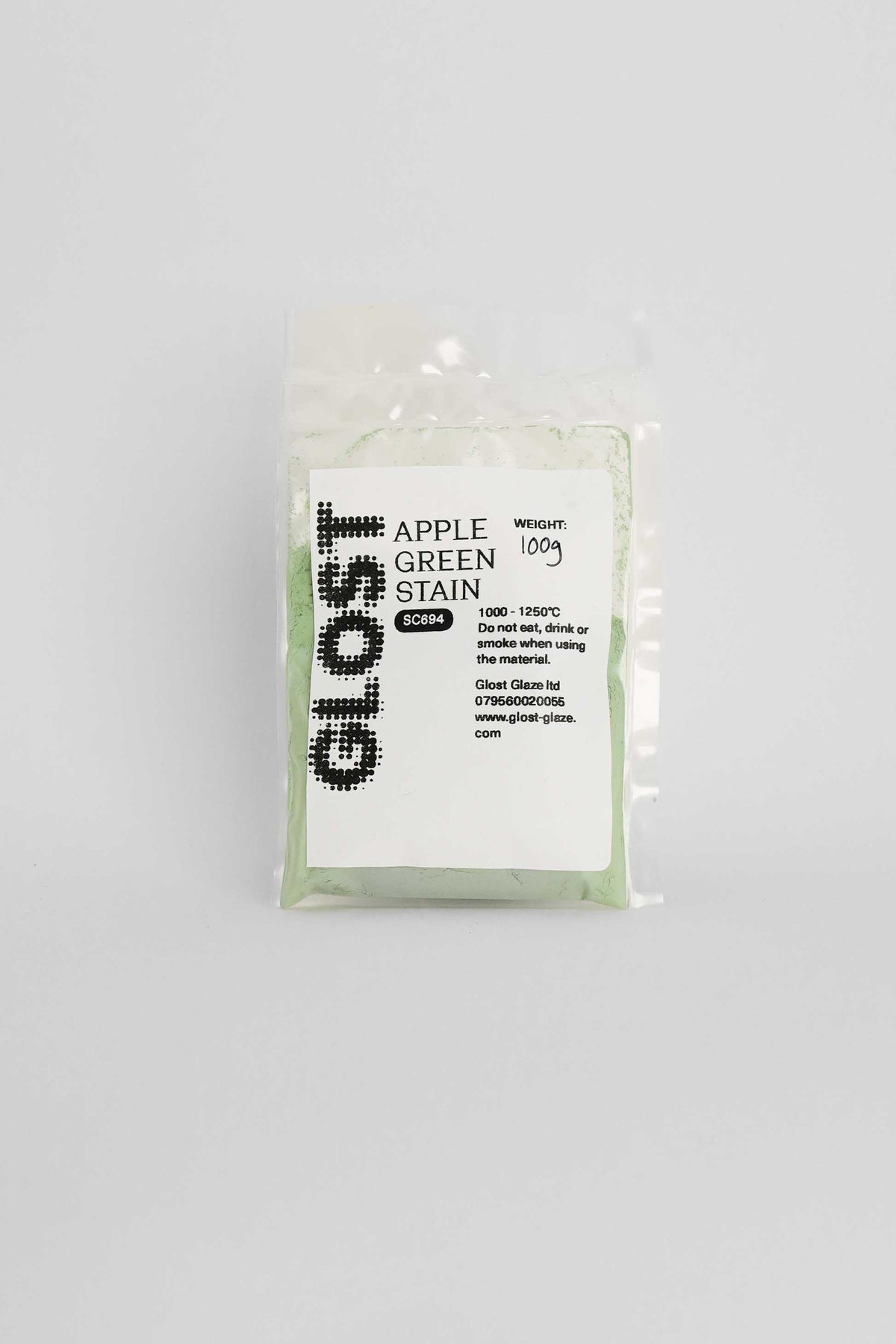 Apple Green ceramic stain by GLOST Glaze, 100g sachet, for colouring glazes, slips, and clay bodies. Made in Britain.
