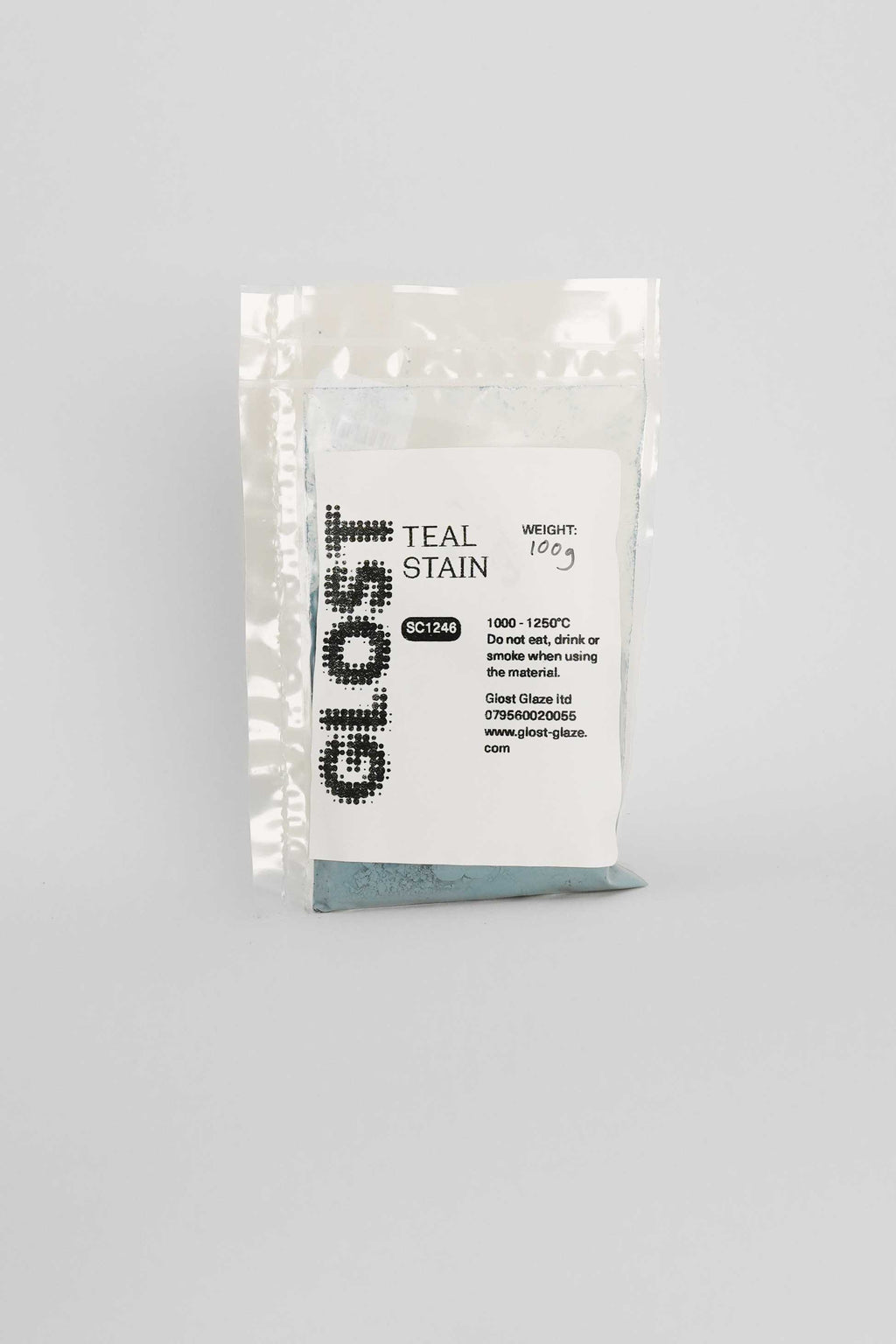 Teal ceramic stain by GLOST Glaze, 100g sachet, for colouring glazes, slips, and clay bodies. Made in Britain.
