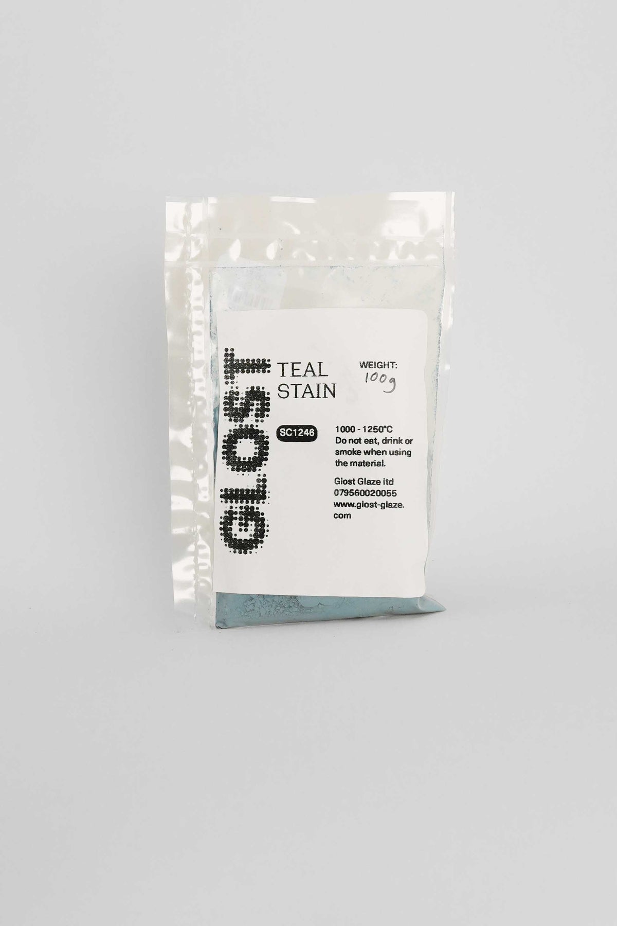 Teal ceramic stain by GLOST Glaze, 100g sachet, for colouring glazes, slips, and clay bodies. Made in Britain.