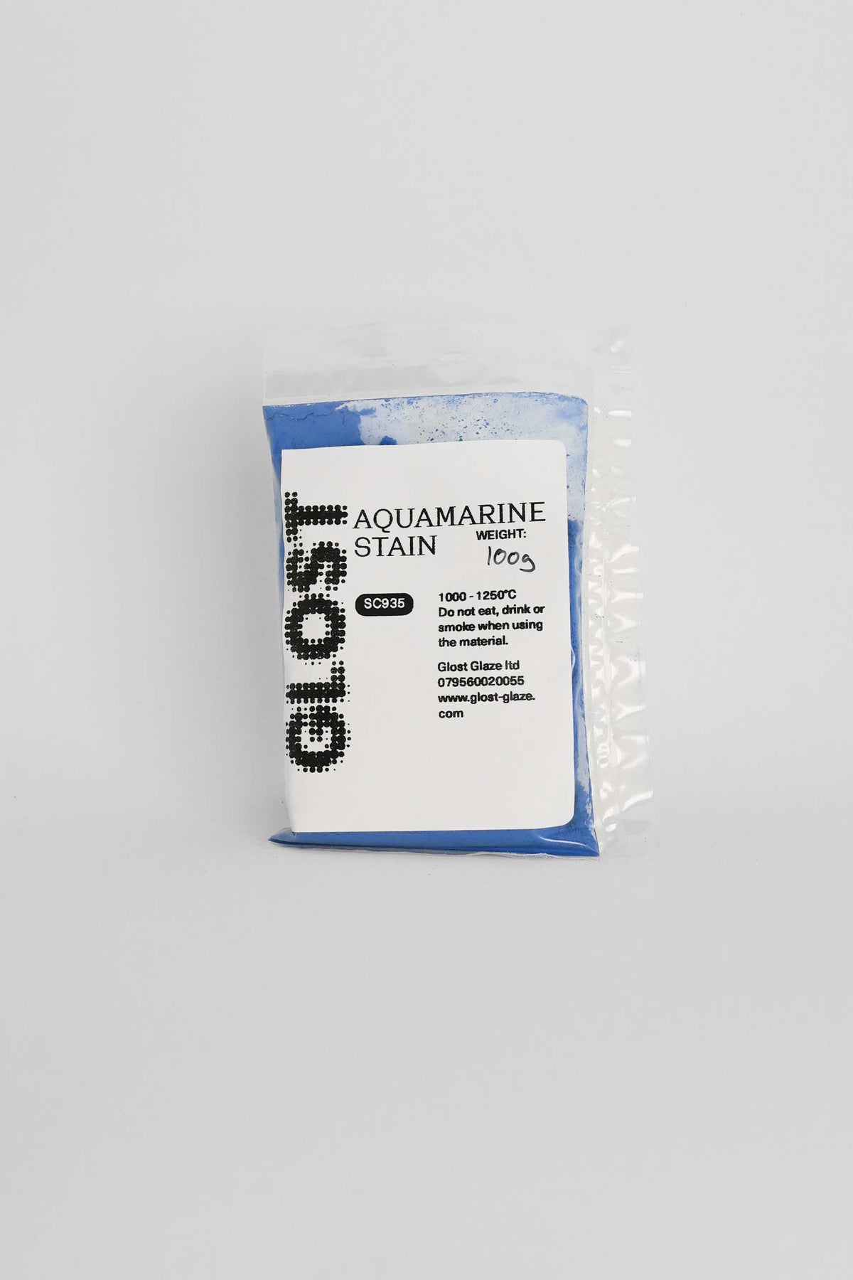 Aquamarine ceramic stain by GLOST Glaze, 100g sachet, for colouring glazes, slips, and clay bodies. Made in Britain.