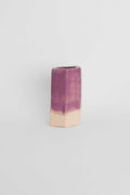 Fired sample tile showing Violet ceramic stain by GLOST Glaze in a transparent glaze on white stoneware