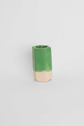 Fired sample tile showing Apple Green ceramic stain by GLOST Glaze in a transparent glaze on white stoneware
