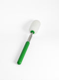 Telescopic sponge on a stick laid flat, white foam head on a green handle with the shaft part extended