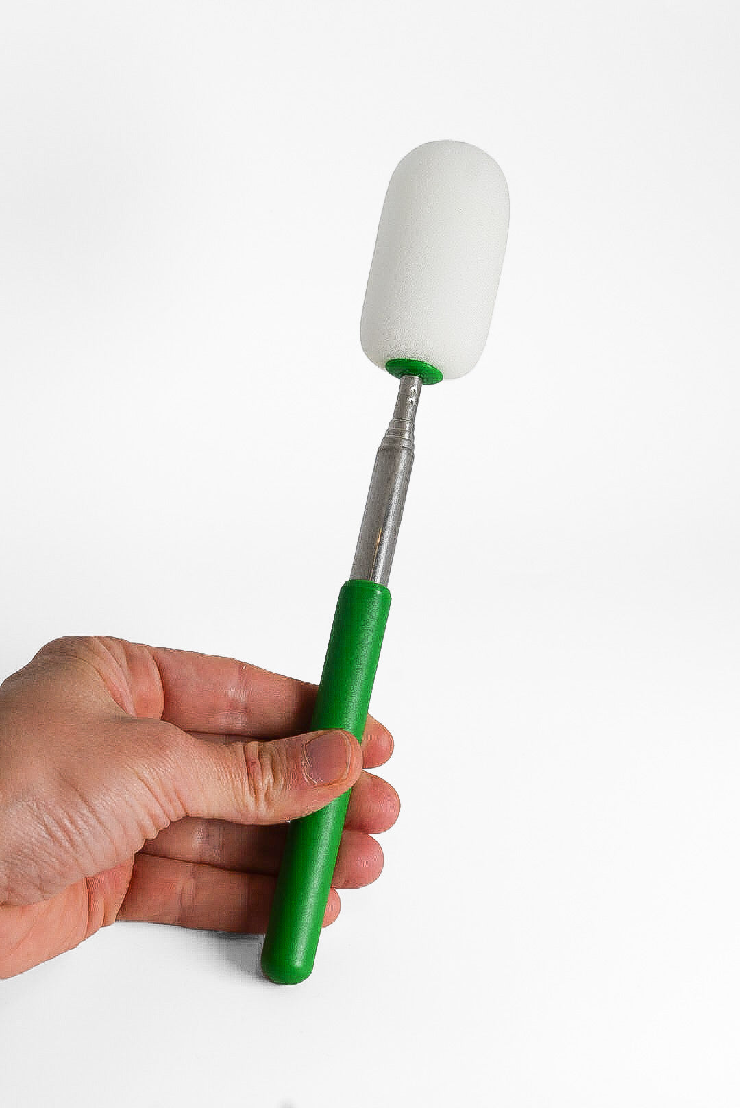 Telescopic sponge on a stick: synthetic sponge head on an extendable handle, for reaching inside tall or narrow thrown vessels.